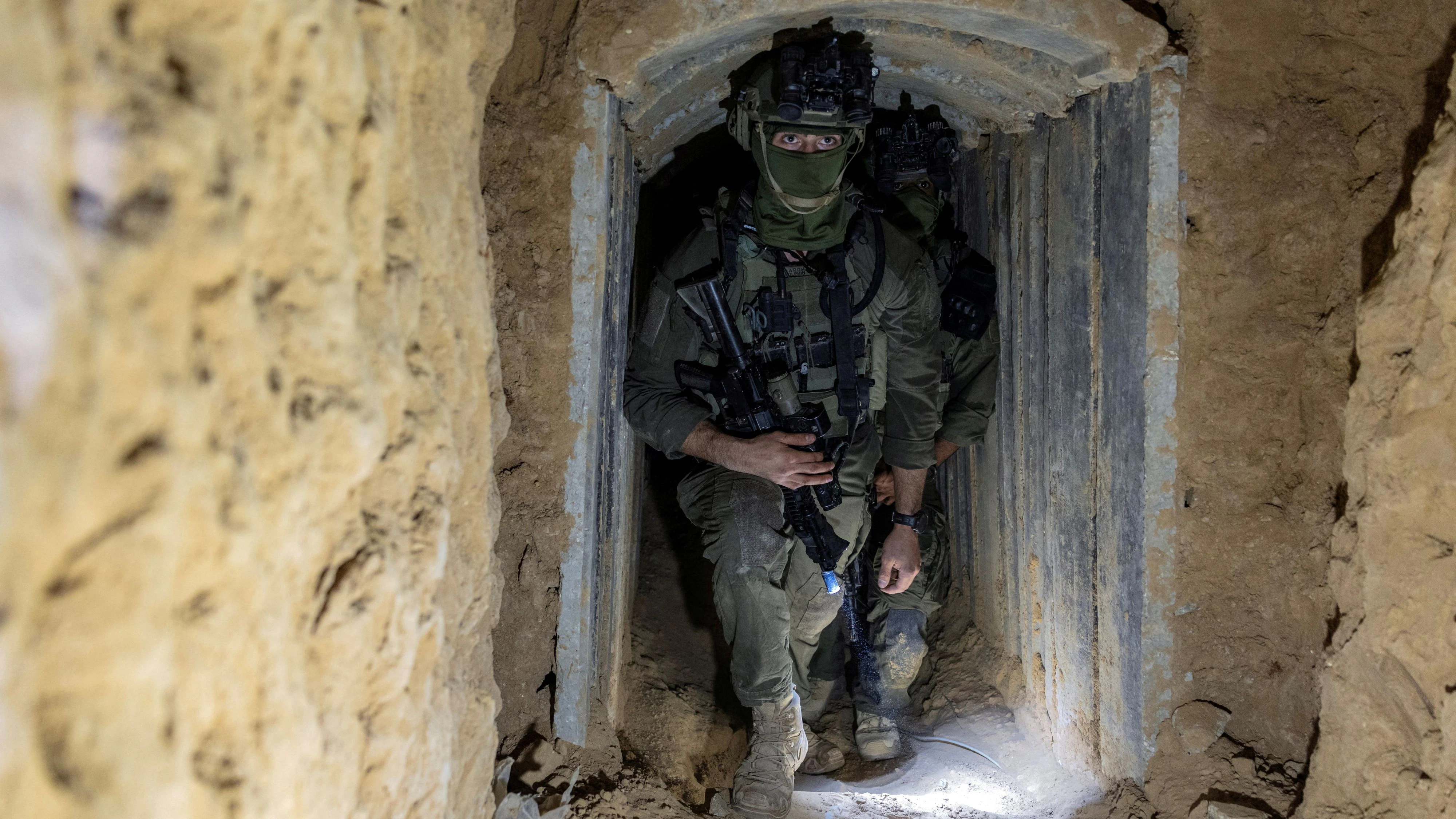 Israeli soldiers in a tunnel where, according to Israel's military, Hamas militants held the body of Israeli officer Hadar Goldin, in Rafah in the southern Gaza Strip, December 8, 2025. The tunnel is part of a ten kilometer tunnel network that reaches the area of Khan Younis, according to the Israeli military. Goldin was killed during the 2014 Israel-Gaza war. His remains were returned in November as part of a ceasefire between Israel and Hamas. REUTERS/Nir Elias    REUTERS EDITOR'S NOTE: PHOTOGRAPHS WERE REVIEWED BY THE IDF AS PART OF THE CONDITIONS OF THE EMBED. NO PHOTOS WERE REMOVED     TPX IMAGES OF THE DAY     
