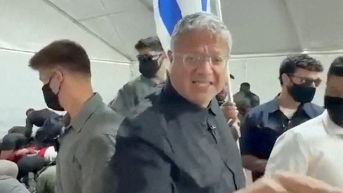 Israeli National Security Minister Itamar Ben Gvir reacts as flotilla activists are detained by Israeli forces, in Ashdod Port, Israel, in this screen grab taken from a video released on May 20, 2026. Office Of Itamar Ben Gvir/Handout via REUTERS    THIS IMAGE HAS BEEN SUPPLIED BY A THIRD PARTY MANDATORY CREDIT  VERIFICATION LINES:  - Deck structure, bridge, stairs and container of the ship seen in video  matched Reuters footage of an Israeli vessel arriving in Ashdod port on May 20 and reportedly carrying activists - Buildings and tent structures matched archive imagery of the Ashdod port and corroborating visuals - Identity of all the detained people could not be independently verified; however Reuters confirmed that some of them were part of the Global Sumud Flotilla by hair and facial features which matched visuals posted on social media by the activists   - Exact date could not verified, but no older version of the video was found posted online before May 20     TPX IMAGES OF THE DAY     