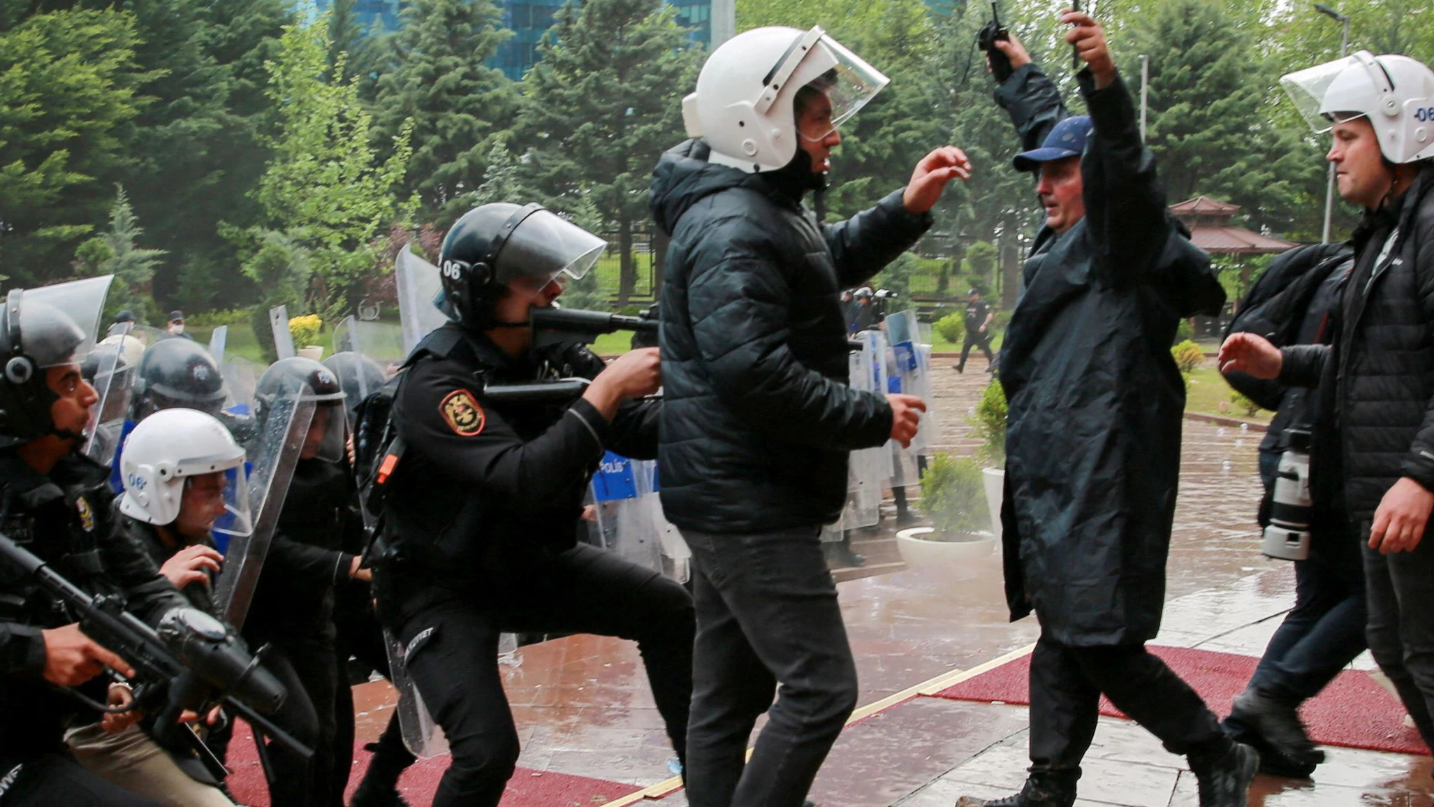 Turkish riot police enter the headquarters of the main opposition Republican People's Party (CHP) to evict its ousted leadership, after authorities ordered enforcement of a court ruling removing the party's leadership from the building, in Ankara, Turkey, May 24, 2026. REUTERS/Efekan Akyuz     TPX IMAGES OF THE DAY     