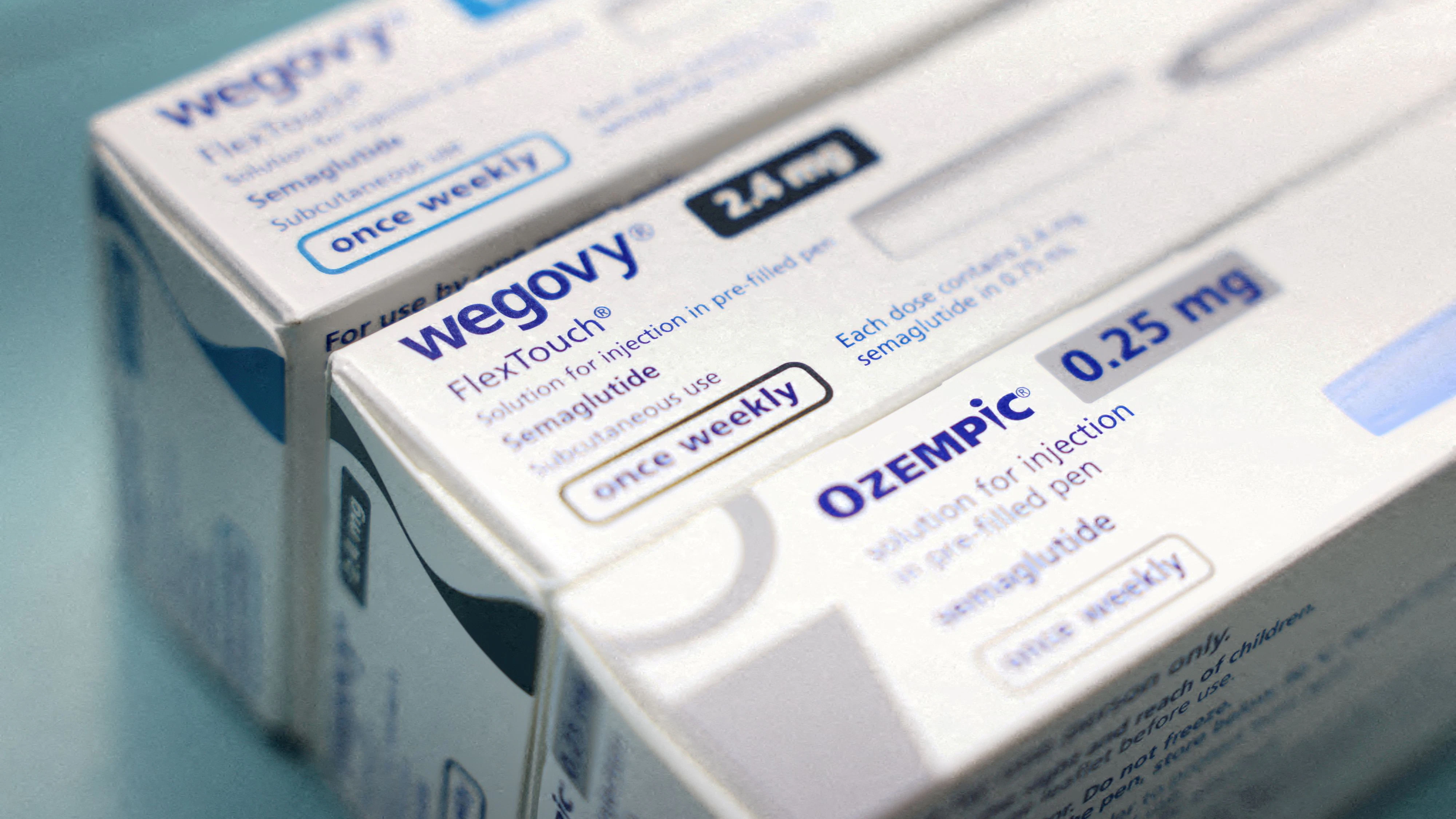 FILE PHOTO: FILE PHOTO: Boxes of Ozempic and Wegovy made by Novo Nordisk are seen at a pharmacy in London, Britain March 8, 2024. REUTERS/Hollie Adams/File Photo/File Photo