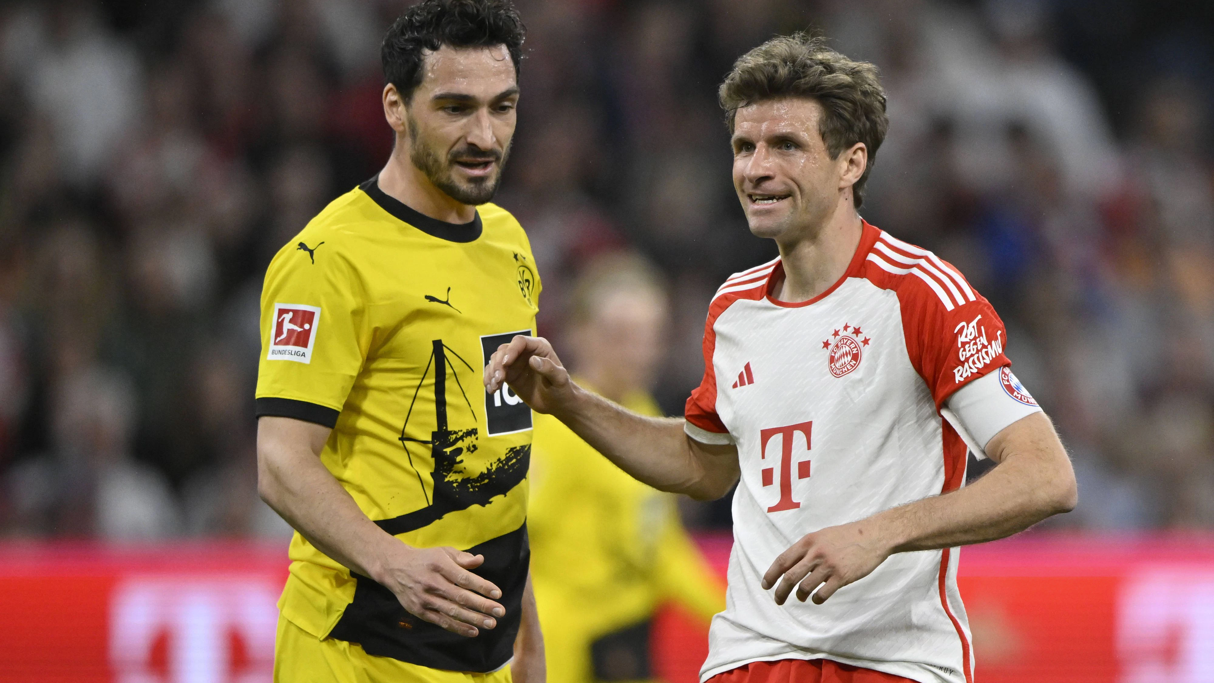 Thomas Mueller FC Bayern Muenchen FCB 25 im Gespraech Diskussion mit Mats Hummels Borussia Dortmund BVB 15 FC Bayern Muenchen FCB vs Borussia Dortmund BVB 30.03.2024 DFL REGULATIONS PROHIBIT ANY USE OF PHOTOGRAPHS AS IMAGE SEQUENCES AND/OR QUASI-VIDEO FC Bayern Muenchen FCB vs Borussia Dortmund BVB *** Thomas Mueller FC Bayern Muenchen FCB 25 in conversation Discussion with Mats Hummels Borussia Dortmund BVB 15 FC Bayern Muenchen FCB vs Borussia Dortmund BVB 30 03 2024 DFL REGULATIONS PROHIBIT ANY USE OF PHOTOGRAPHS AS IMAGE SEQUENCES AND OR QUASI VIDEO FC Bayern Muenchen FCB vs Borussia Dortmund BVB