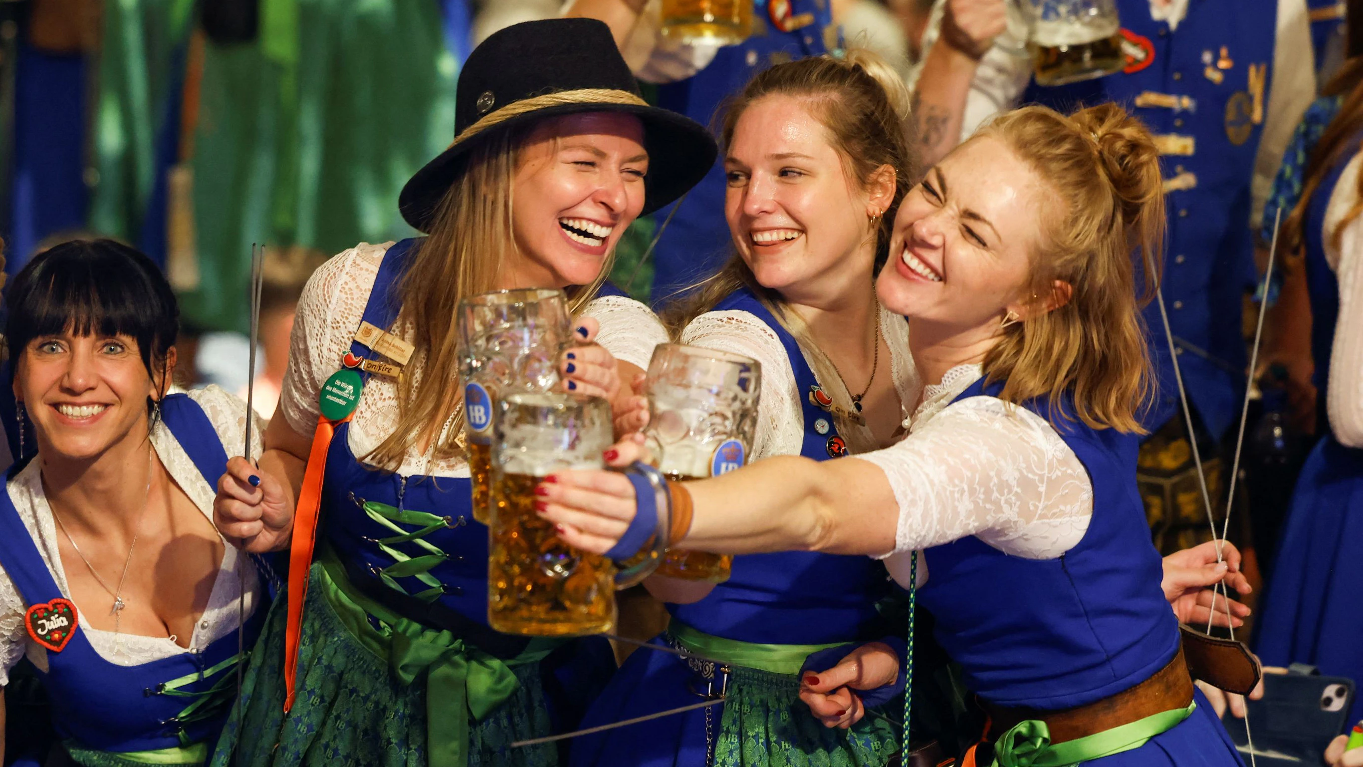 Oktoberfest waitresses toast with beer while they celebrate the end of the world’s biggest beer festival, the 189th Oktoberfest, in Munich, Germany, October 6, 2024. REUTERS/Michaela Stache