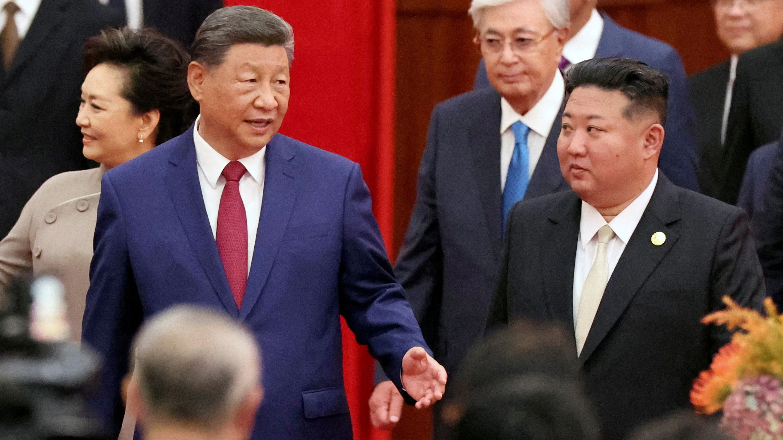 FILE PHOTO: Chinese President Xi Jinping and North Korean leader Kim Jong Un arrive for a reception marking the 80th anniversary of the end of World War Two, at the Great Hall of the People in Beijing, China September 3, 2025. REUTERS/Florence Lo/File Photo
