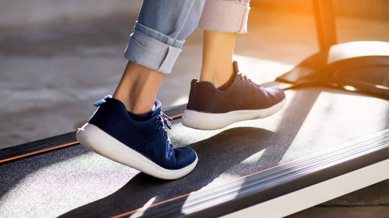 Women jogging on the treadmill