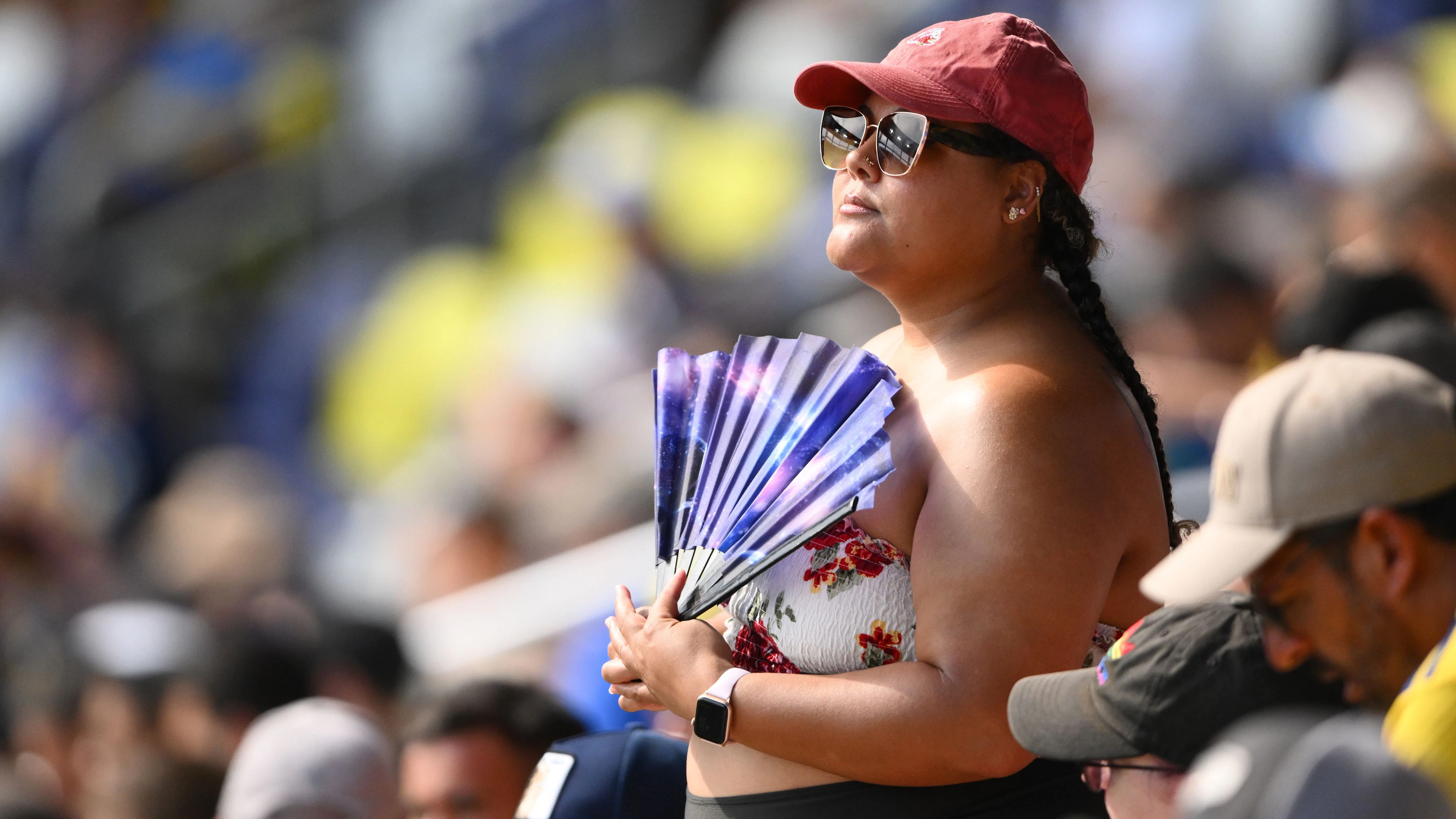 Jun 24, 2025; Nashville, Tennessee, USA; A fan holds a fan for relief from the heat during the second half during a group stage match of the 2025 FIFA Club World Cup at GEODIS Park. Mandatory Credit: Steve Roberts-Imagn Images