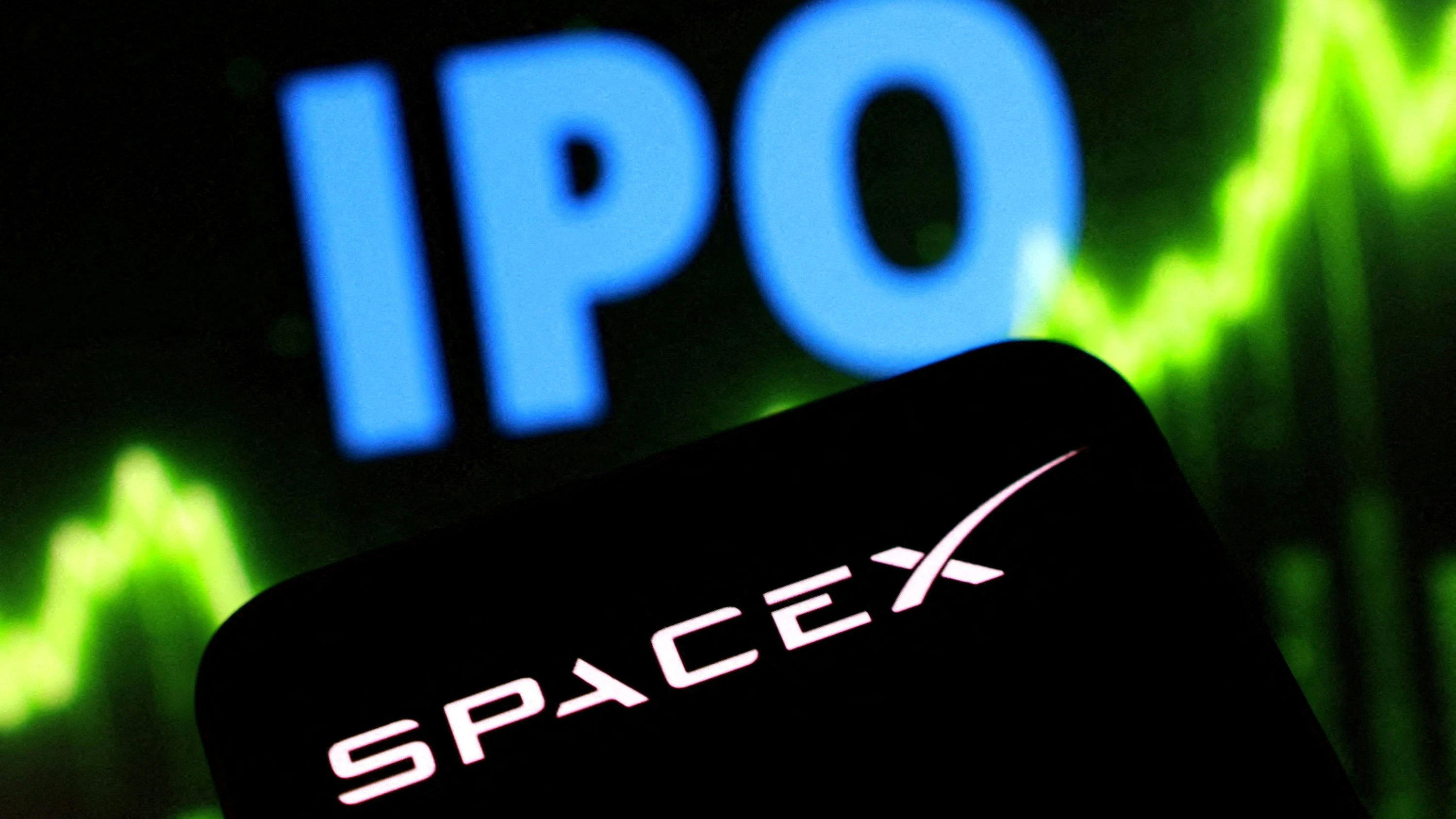 FILE PHOTO: SpaceX logo, the word "IPO", and a rising stock graph are seen in this illustration taken June 5, 2026. REUTERS/Dado Ruvic/Illustration/File Photo
