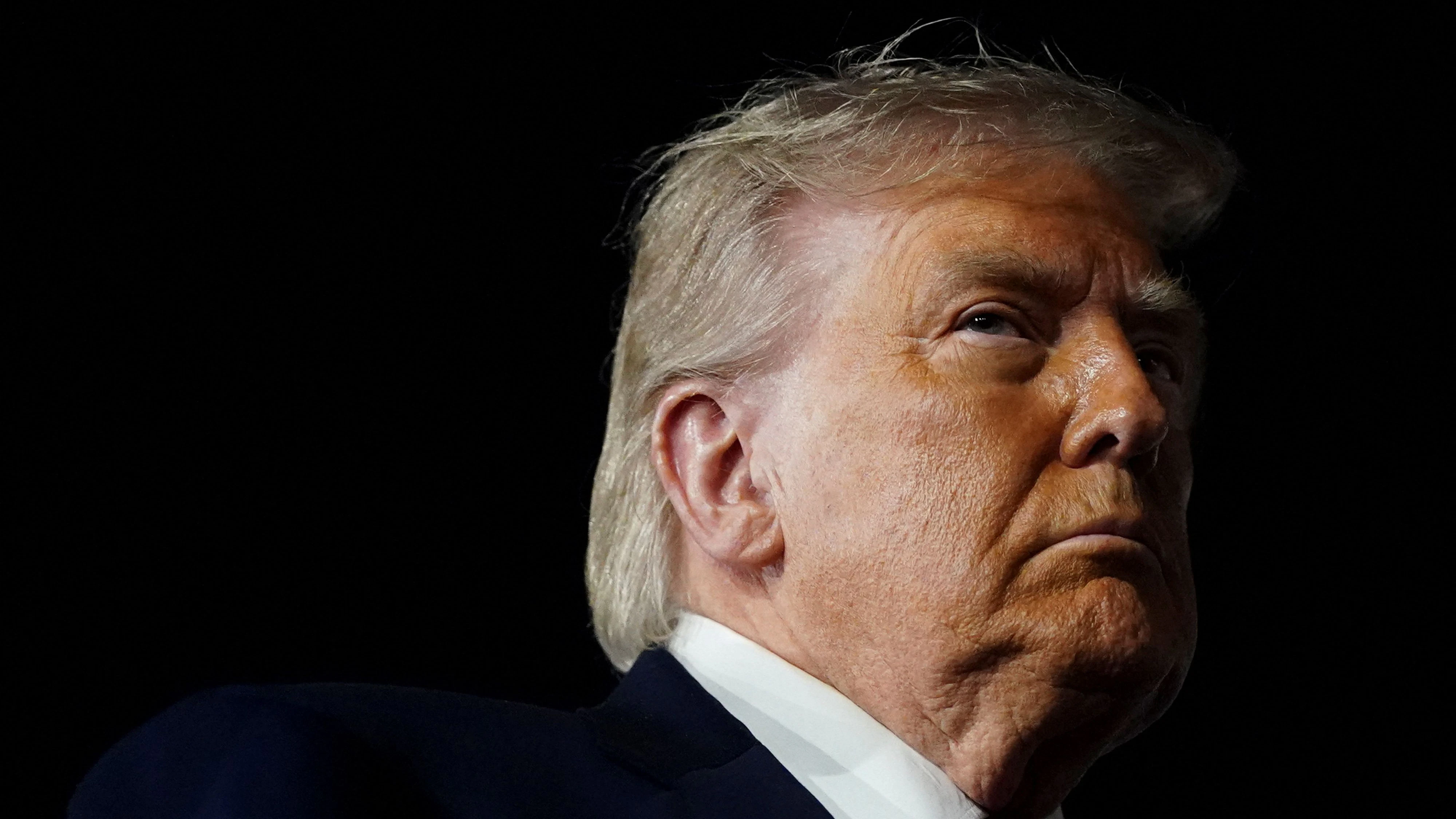 U.S. President Donald Trump looks on, after attending Game 3 of the NBA Finals, at John F. Kennedy International Airport in New York, U.S., June 8, 2026. REUTERS/Nathan Howard