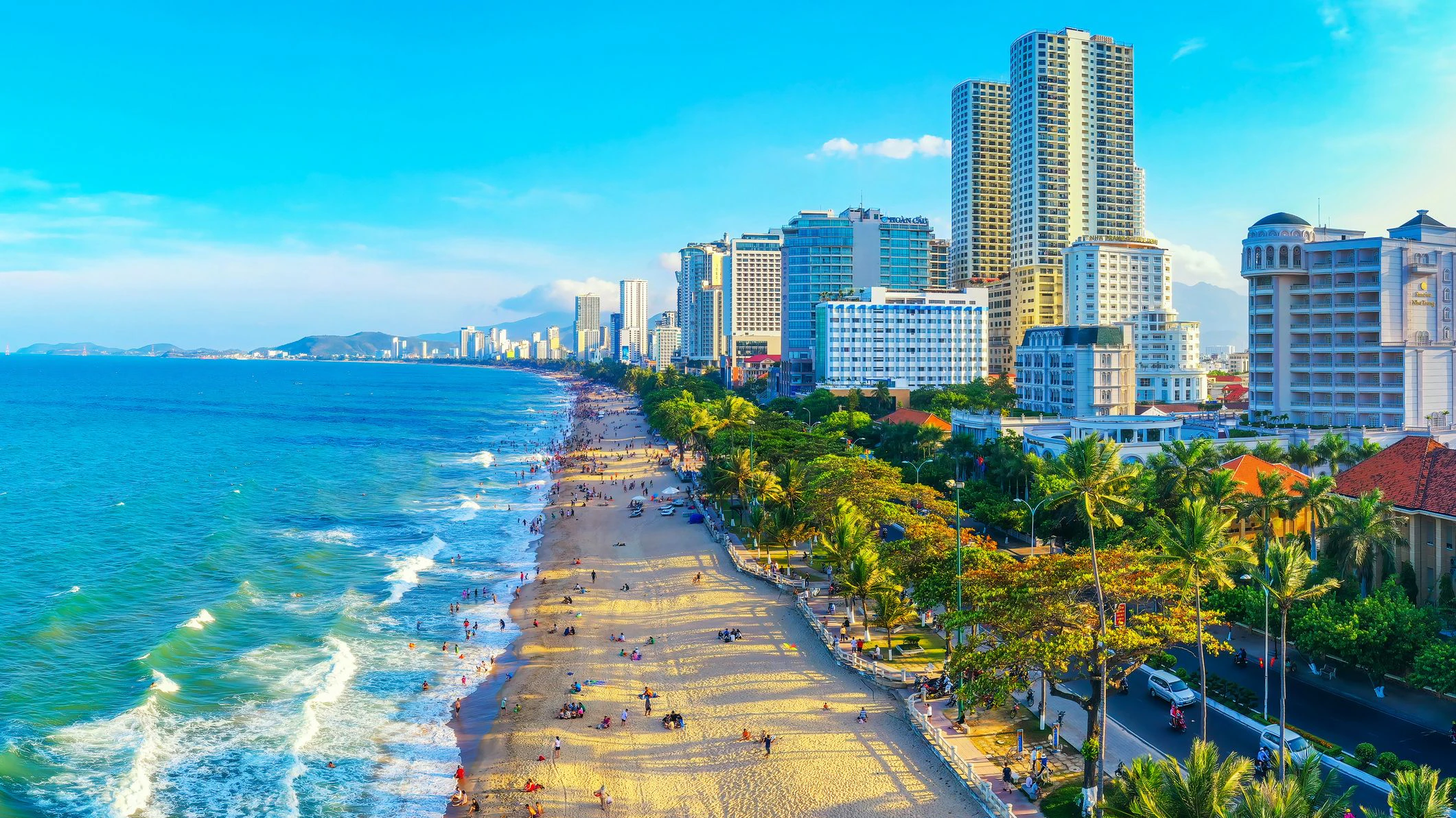 The coastal city of Nha Trang seen from above in the afternoon with its beautiful city and clean sandy beach attracts tourists to visit in Nha Trang, Vietnam