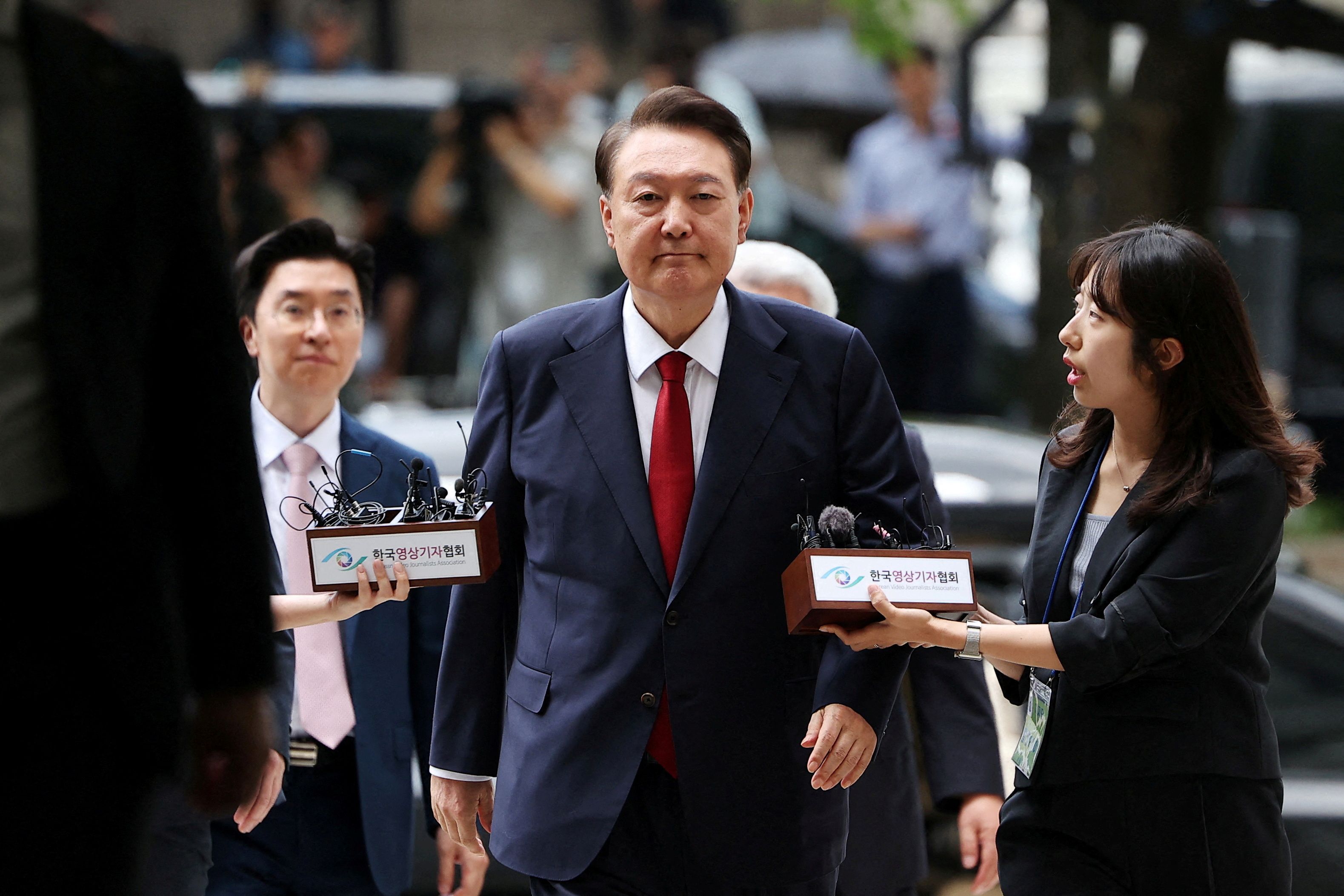 FILE PHOTO: Former South Korean President Yoon Suk Yeol arrives at a court to attend a hearing to review his arrest warrant requested by special prosecutors in Seoul, South Korea, July 9, 2025.   REUTERS/Kim Hong-Ji/Pool/File Photo