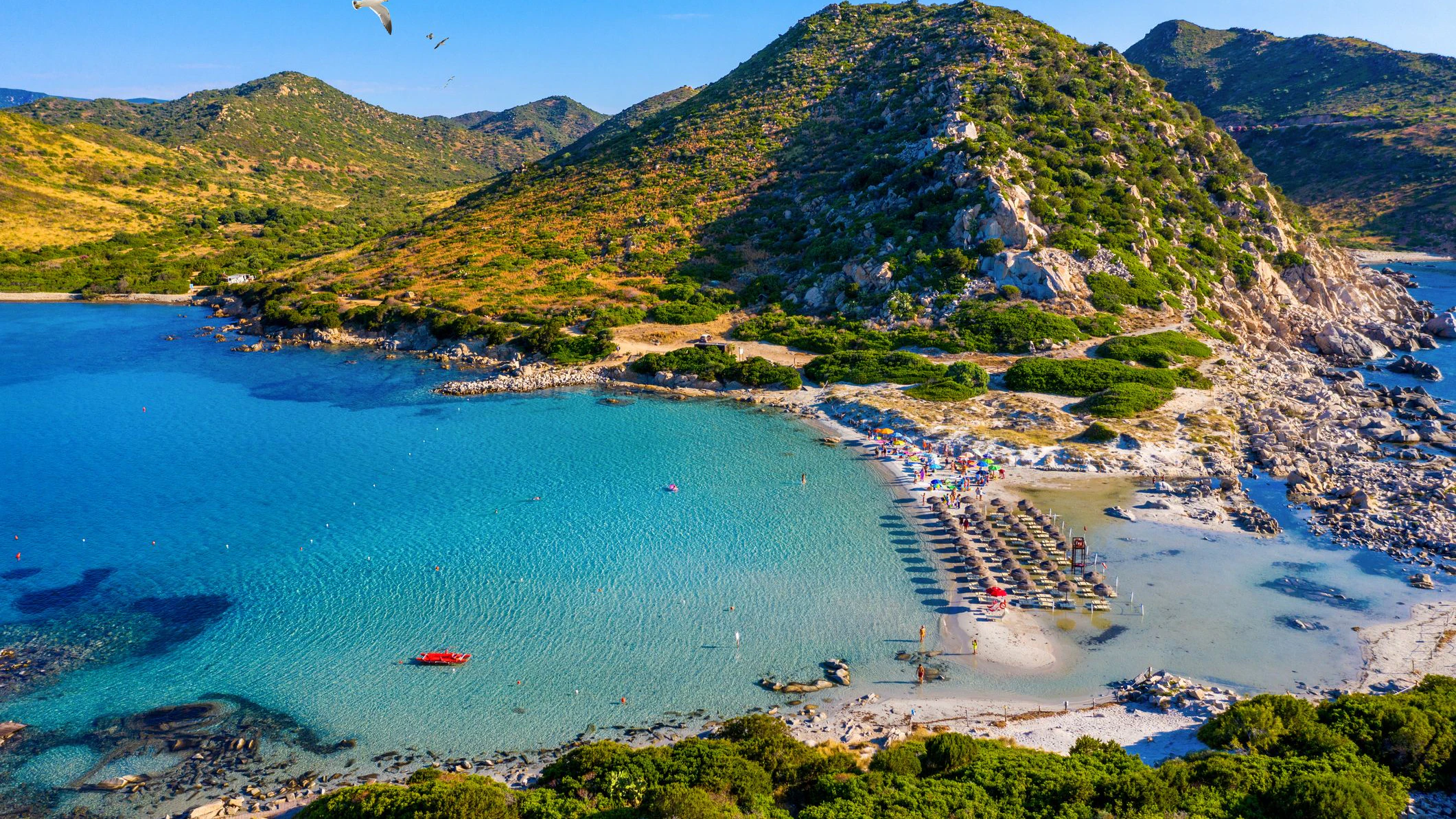 Cost of Sardinia: Peninsula of Punta Molentis. View of beautiful beach at Punta Molentis, Villasimius, Sardinia, Italy. Beautiful bay with sandy beach at Punta Molentis, Sardinia island, Italy.