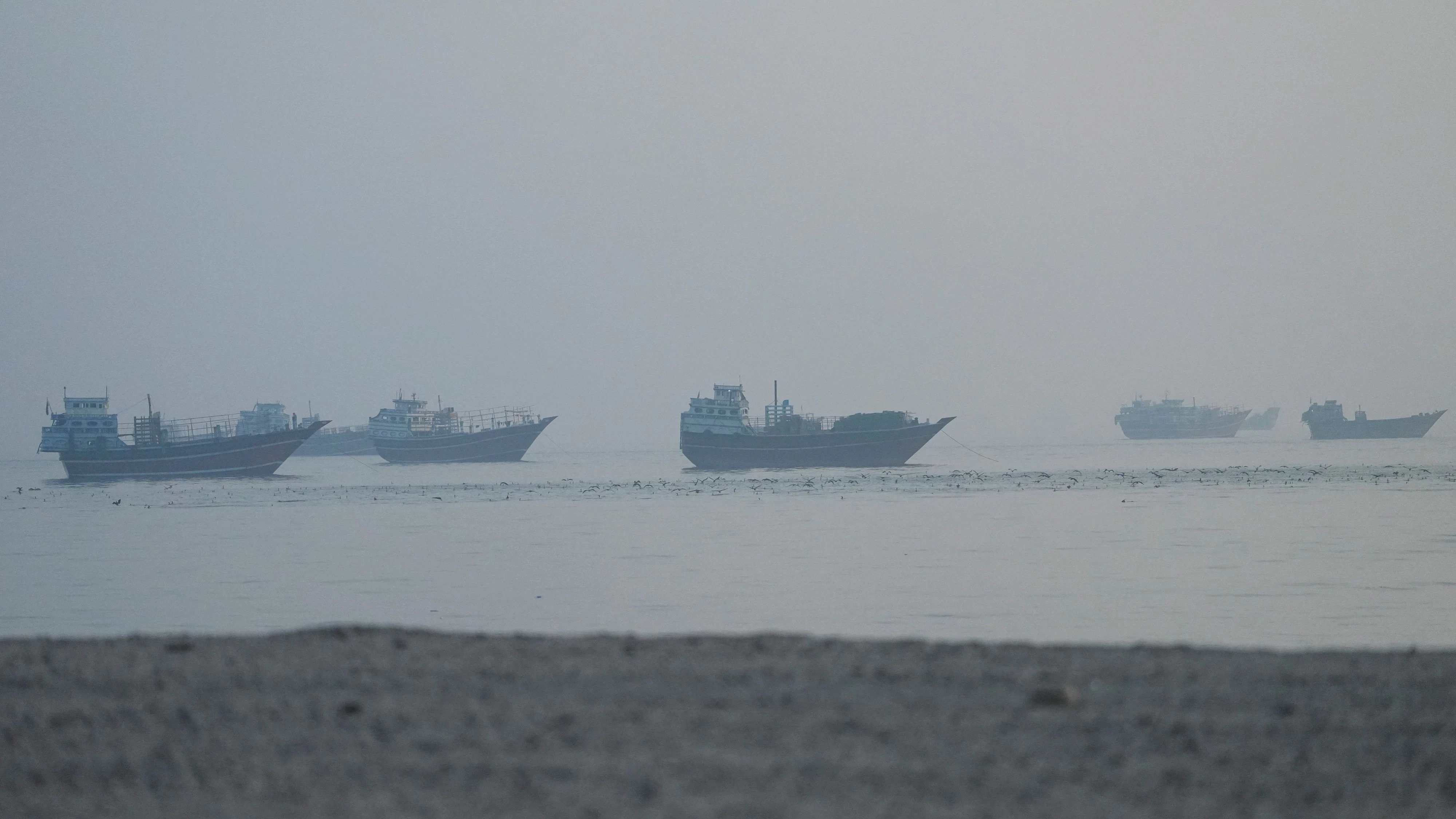 Vessels in the Strait of Hormuz, as seen from Musandam, Oman, June 15, 2026. REUTERS/Stringer