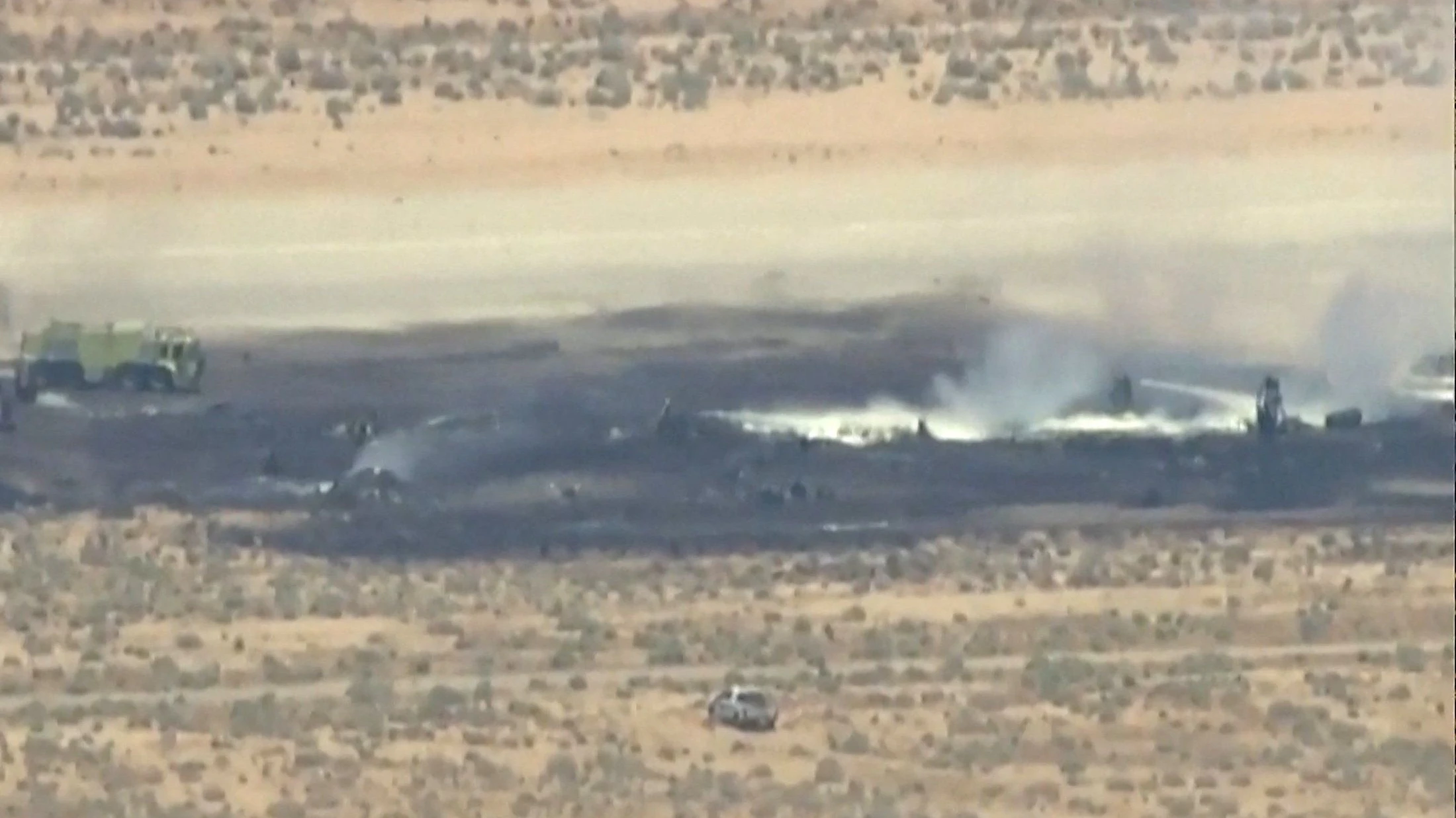 Smoke rises from a blackened part of Edwards Air Force Base after the crash of a U.S. Air Force B-52 bomber aircraft in Edwards, California, U.S., June 15, 2026, in a still image from news helicopter video. ABC Affiliate KABC via REUTERS     NO RESALES. NO ARCHIVES. THIS IMAGE HAS BEEN SUPPLIED BY A THIRD PARTY. BEST QUALITY AVAILABLE