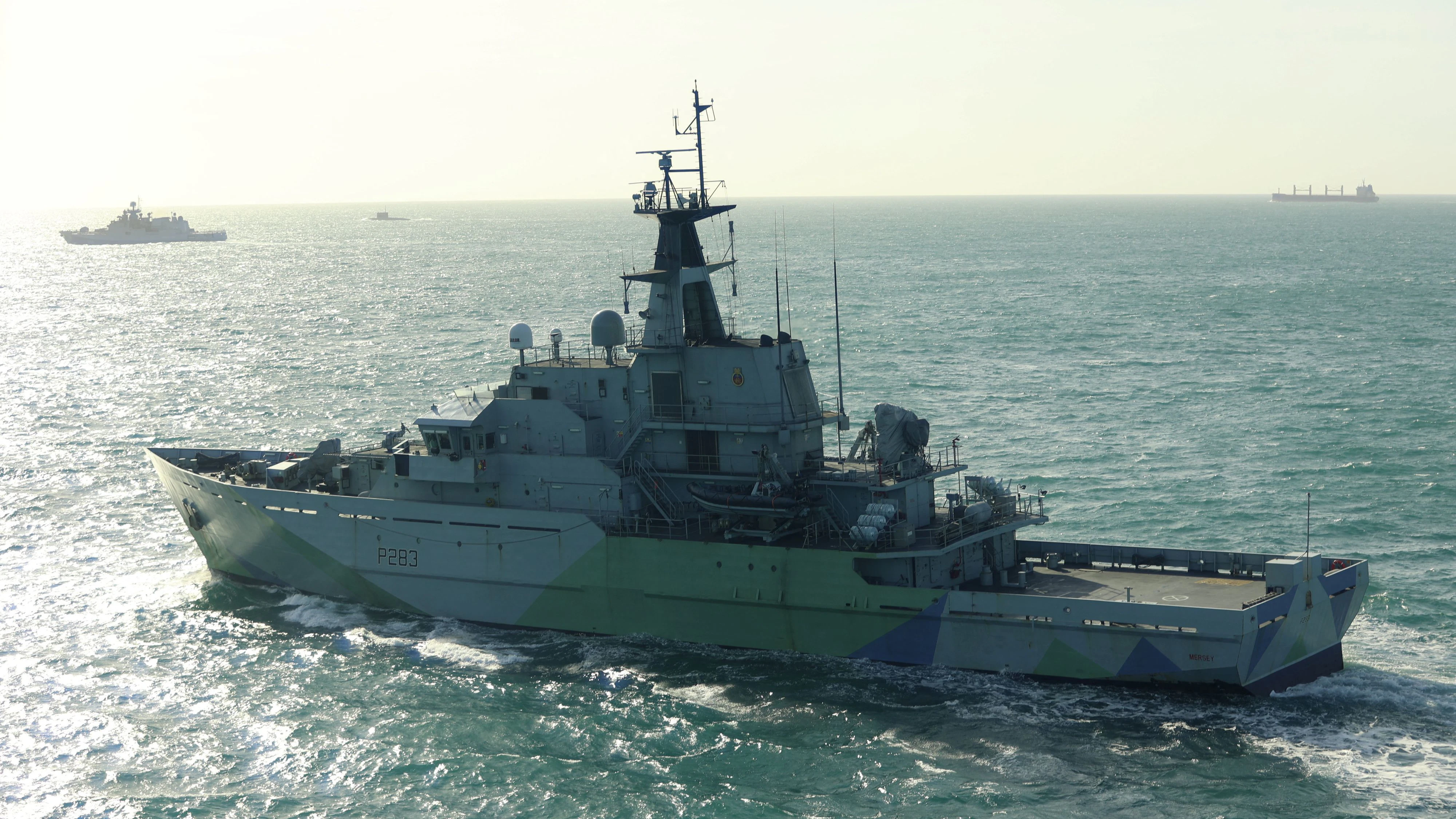 The British Royal Navy's HMS Mersey tracks the Russian Navy's Admiral Grigorovich frigate and Krasnodar submarine at an unknown location, in this undated handout image. UK MOD Crown copyright/Royal Navy/Handout via REUTERS THIS IMAGE HAS BEEN SUPPLIED BY A THIRD PARTY. MANDATORY CREDIT