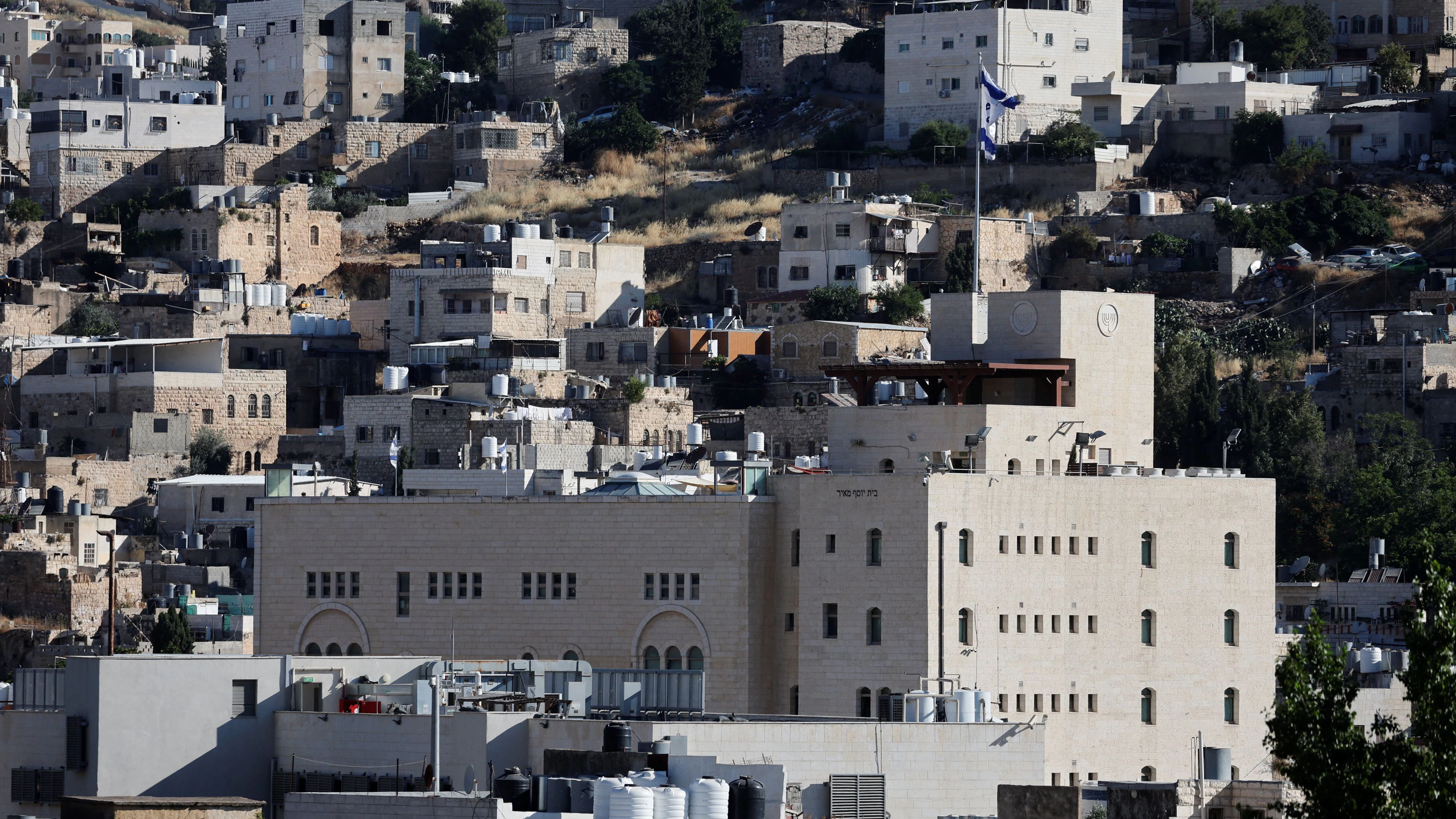 An Israeli settlement building in the old city of Hebron in the Israeli-occupied West Bank June 17, 2026. REUTERS/Mussa Qawasma 