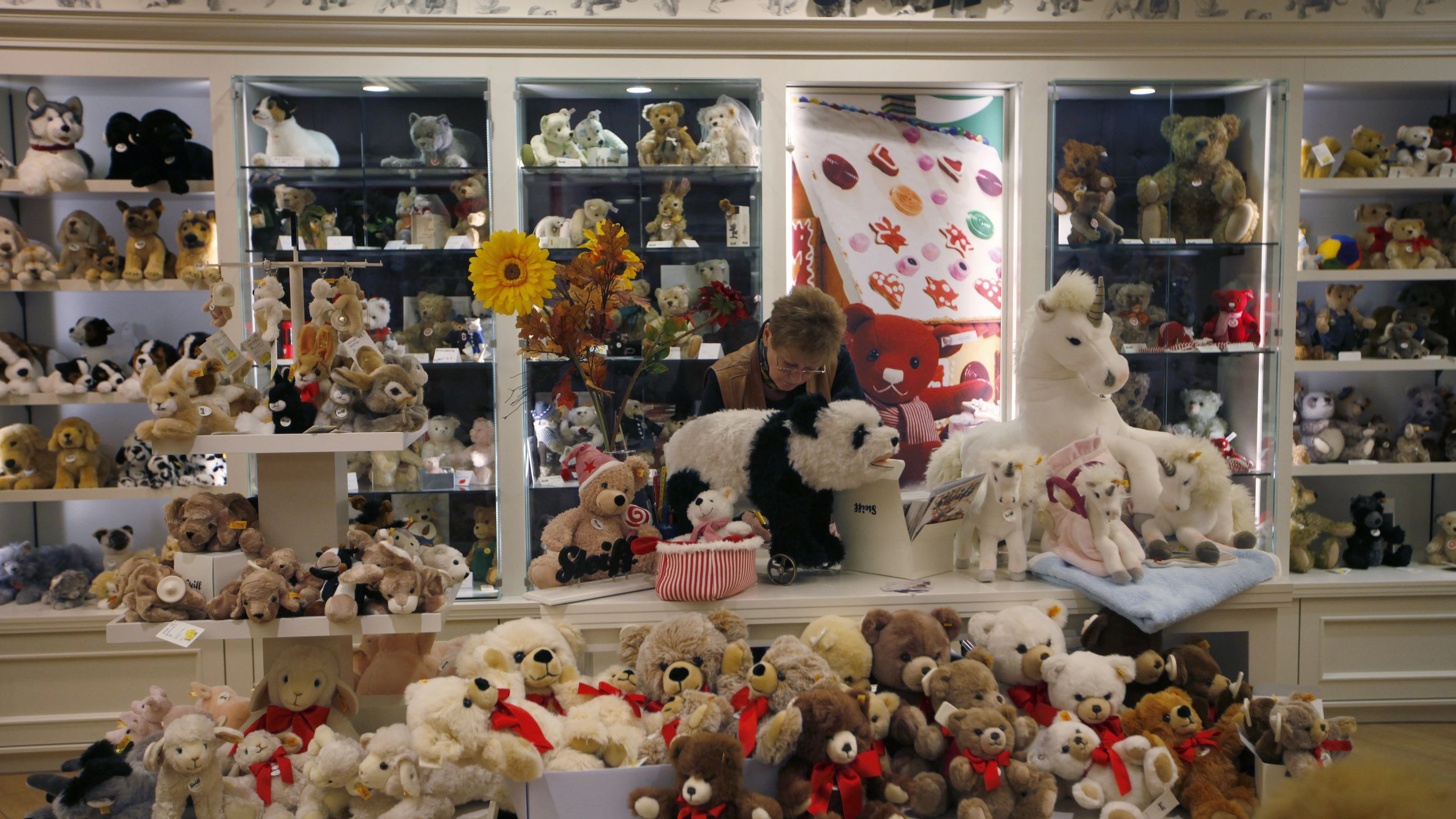 Soft toys made by German toy manufacturer 'Steiff' are seen on display at Luetgenau toy shop in Dortmund, November 28, 2011. Rising prices, muted wages growth and swingeing austerity measures have squeezed disposable incomes across Europe. And fears a debt crisis could blow the euro apart and bring down banks have dashed hopes of an improvement any time soon. Retailers face different fortunes as shoppers seem determined to ringfence at least some areas of Christmas spending, like presents for their children and good food. Picture taken November 28, 2011. REUTERS/Ina Fassbender (GERMANY - Tags: BUSINESS SOCIETY)