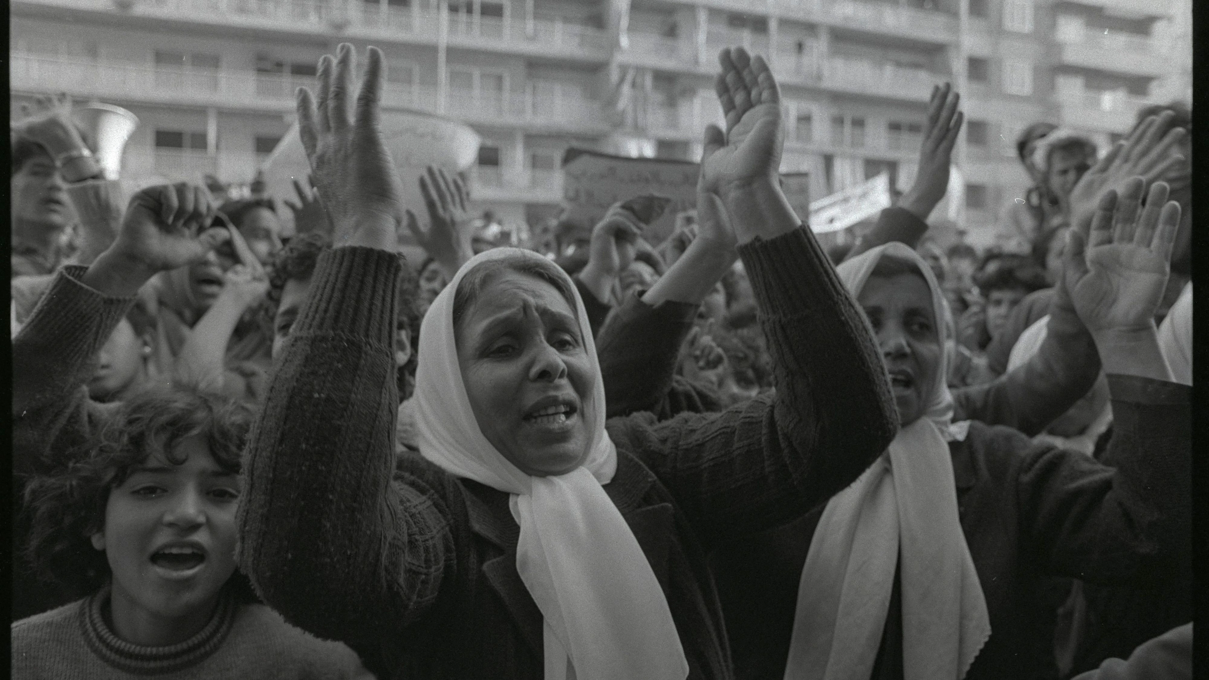 Angry Palestinian women demonstrate in front of the Iranian embassy in West Beirut against a siege by Shi'ite Amal militiamen around refugee camps in Lebanon.  February 7, 1987 REUTERS/Aline Manoukian 87077084  BEIRUT DEMONSTRATION EMBASSY IRAN LEBANON PALESTINIAN REFUGEE WOMAN    DISCLAIMER: The image is presented in its original, uncropped, and untoned state. Due to the age and historical nature of the image, we recommend verifying all associated metadata, which was transferred from the index stored by the Bettmann Archives, and may be truncated.