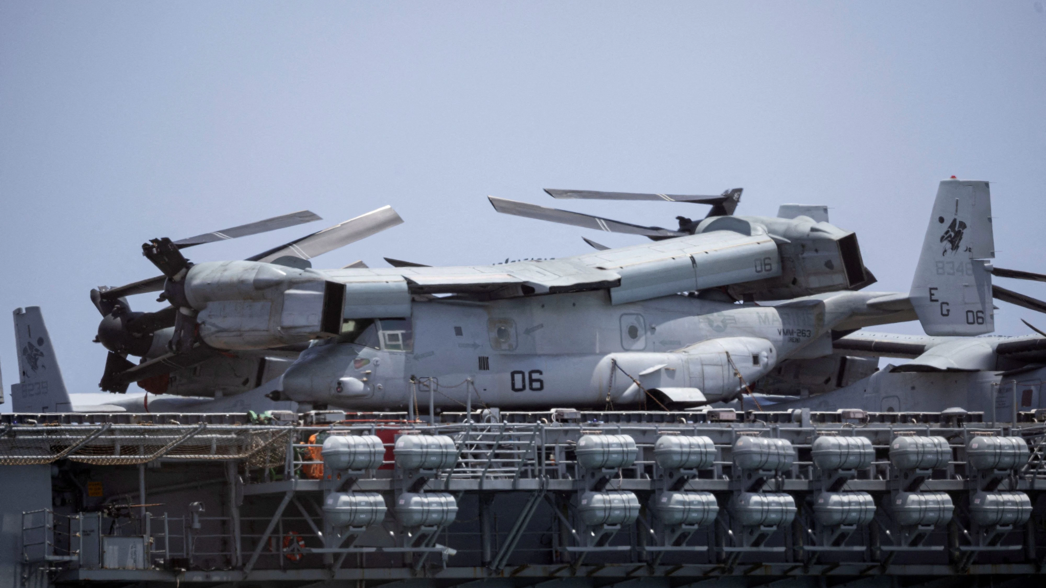 U.S. Marine Corps MV-22 Osprey tiltrotor aircraft with folded rotor blades are parked on the flight deck of the U.S. Navy Wasp-class amphibious assault ship USS Iwo Jima at the Port of Ponce in Ponce, Puerto Rico, May 27, 2026. REUTERS/Ricardo Arduengo REFILE - UPDATING SLUG 