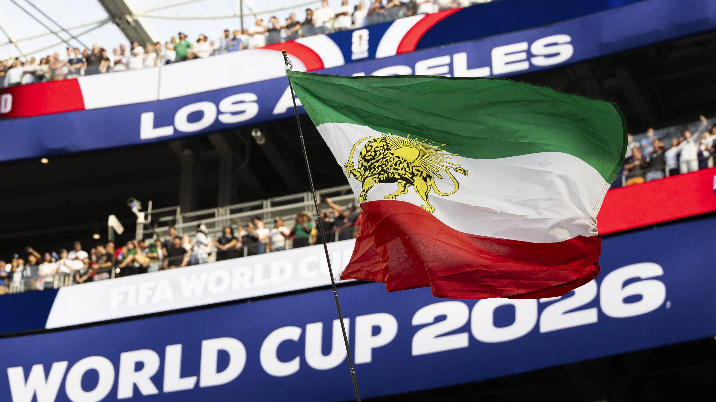 June 15, 2026, Los Angeles, California, USA: A soccer fan waves a flag during the FIFA World Cup, WM, Weltmeisterschaft, Fussball Group G soccer match between the IR Iran and the New Zealand at SoFi Stadium in Inglewood, Calif., Monday, June 15, 2026. Los Angeles USA - ZUMAc68_ 20260615_zaf_c68_057 Copyright: xRingoxChiux