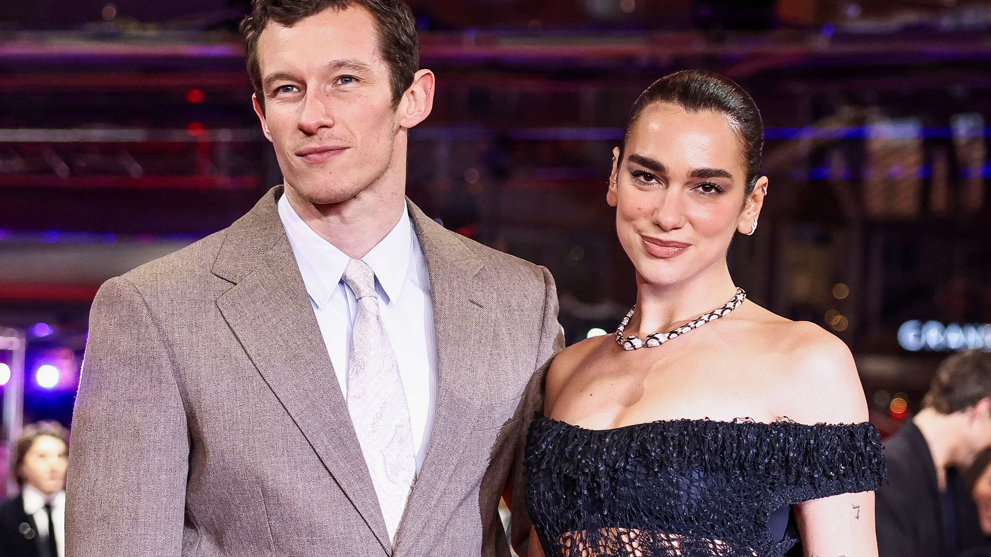 Cast member Callum Turner and Dua Lipa pose on the red carpet for the premiere of 'Rosebush Pruning' at the 76th Berlinale International Film Festival in Berlin, Germany February 14, 2026. REUTERS/Nadja Wohlleben 