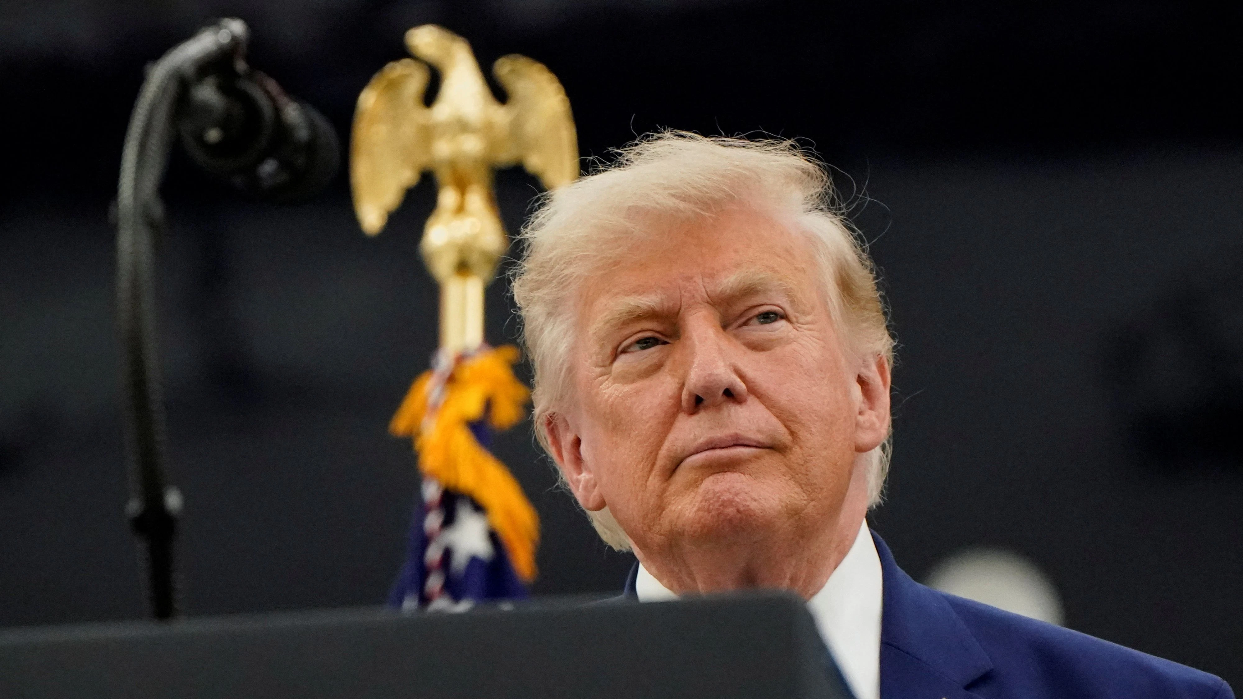 U.S. President Donald Trump looks on as he stands in front of the VC-25B aircraft gifted by Qatar that will be used as Air Force One, at Joint Base Andrews, Maryland, U.S., June 19, 2026. REUTERS/Elizabeth Frantz