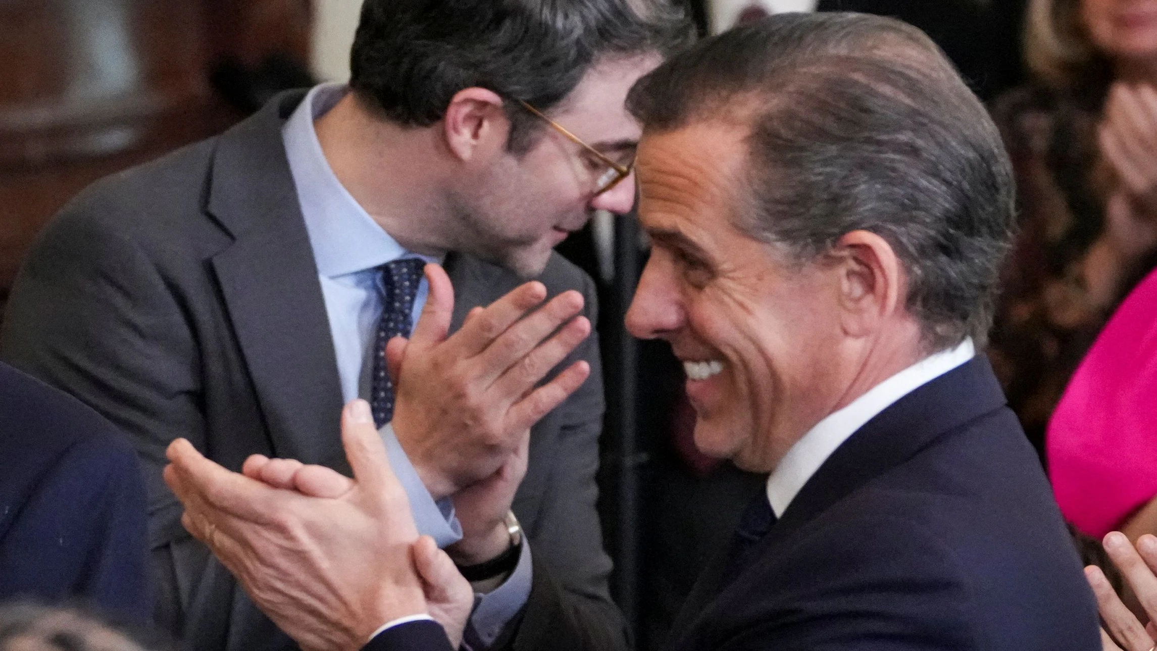Hunter Biden applauds next to former U.S. President Bill Clinton, on the day U.S. President Joe Biden presents the Presidential Medal of Freedom at a ceremony in the East Room of the White House, in Washington, U.S. January 4, 2025. REUTERS/Ken Cedeno