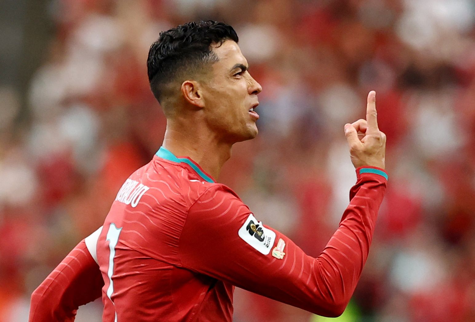 Fußball-Star Cristiano Ronaldo jubelt. 