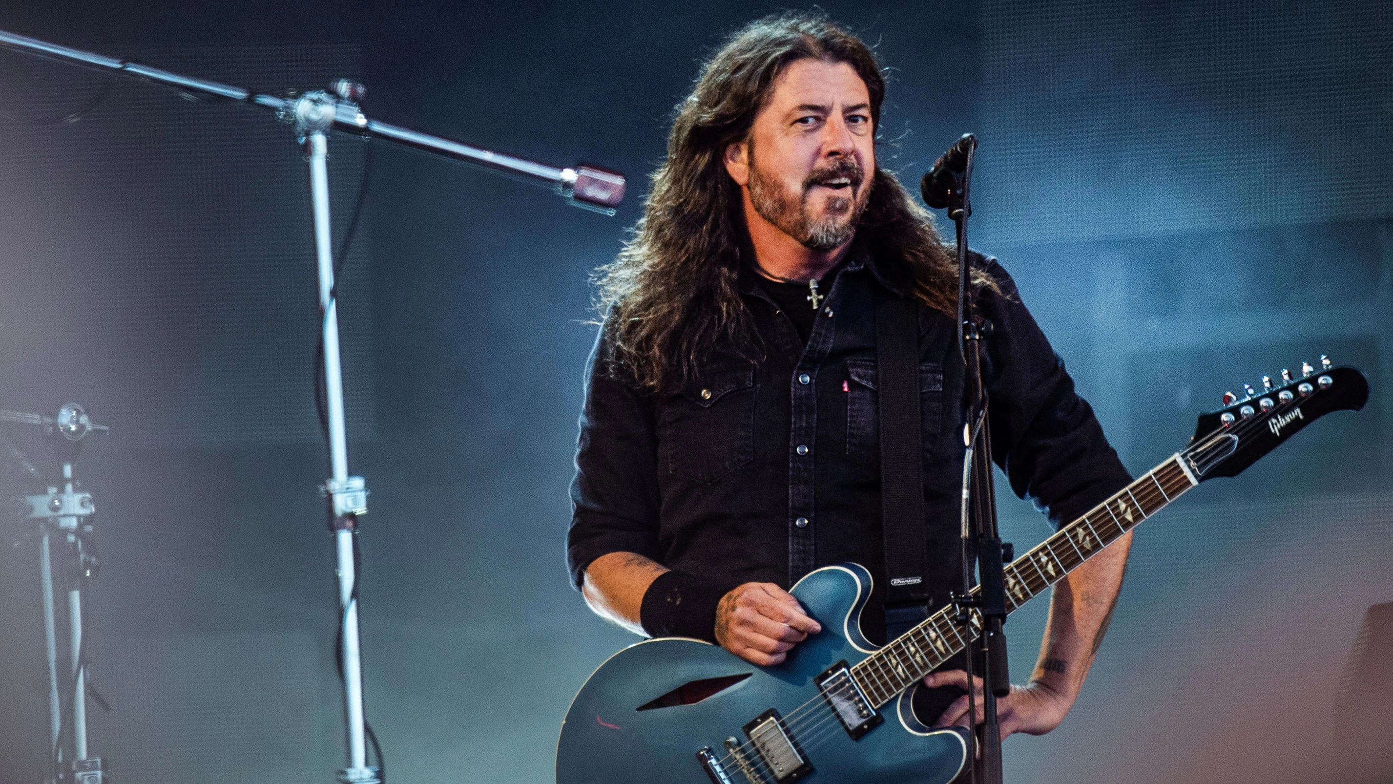 American band Foo Fighters performs on the Orange Stage at Roskilde Festival on Friday, July 5, 2024. Helle Arensbak/Ritzau Scanpix/via REUTERS      ATTENTION EDITORS - THIS IMAGE WAS PROVIDED BY A THIRD PARTY. DENMARK OUT. NO COMMERCIAL OR EDITORIAL SALES IN DENMARK.