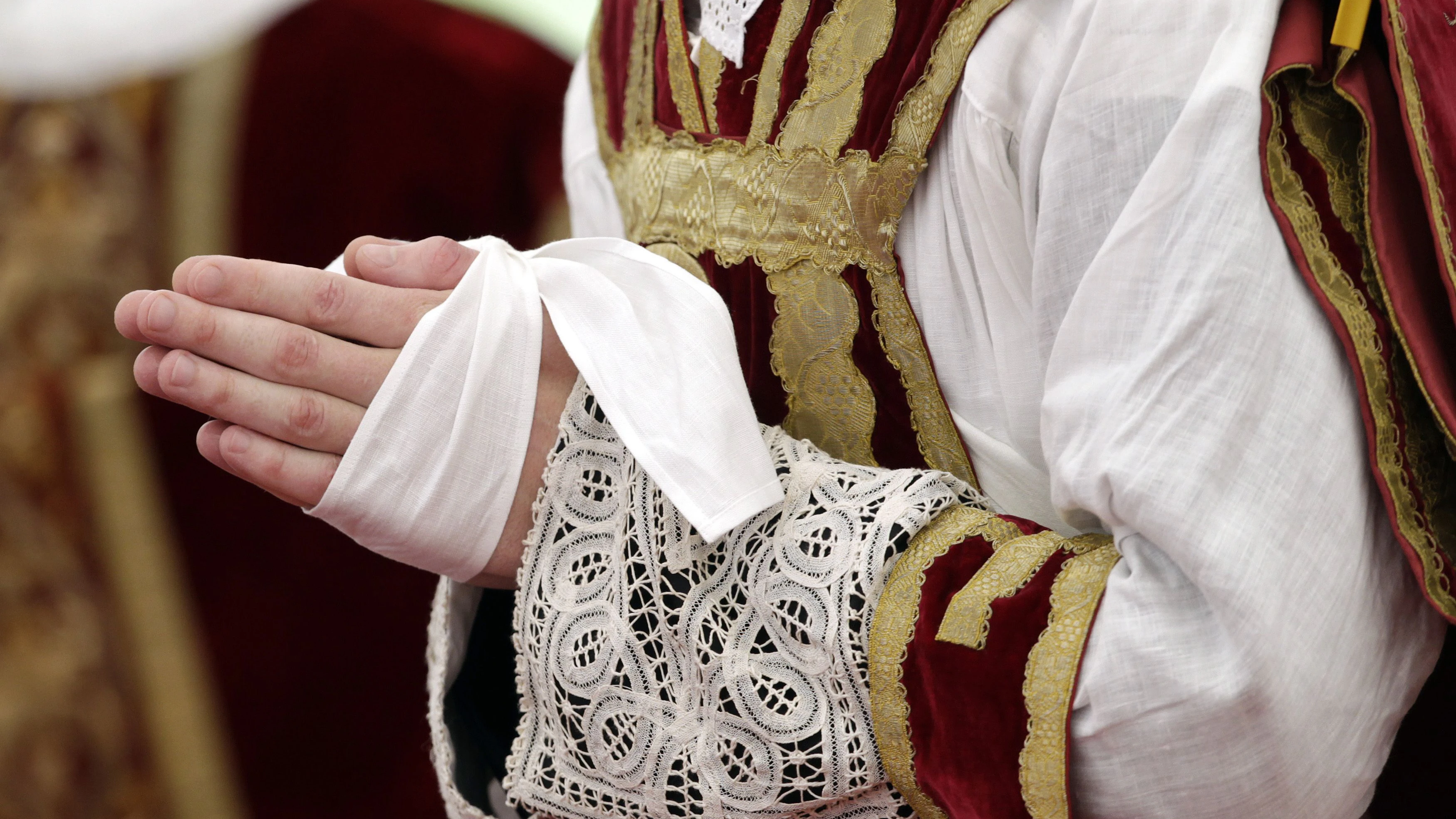 The hands of a newly ordained priest are pictured during a ceremony in Econe June 29, 2012. The Swiss-based Society of Saint Pius X (SSPX), which rejects some of the reforms made at the historic 1962 Second Vatican Council, defied Rome in 1988 by illegally consecrating four bishops, triggering their excommunication by the late Pope John Paul. SSPX says it has about 500 priests and one million followers in 38 countries.  REUTERS/Denis Balibouse (SWITZERLAND - Tags: RELIGION SOCIETY)