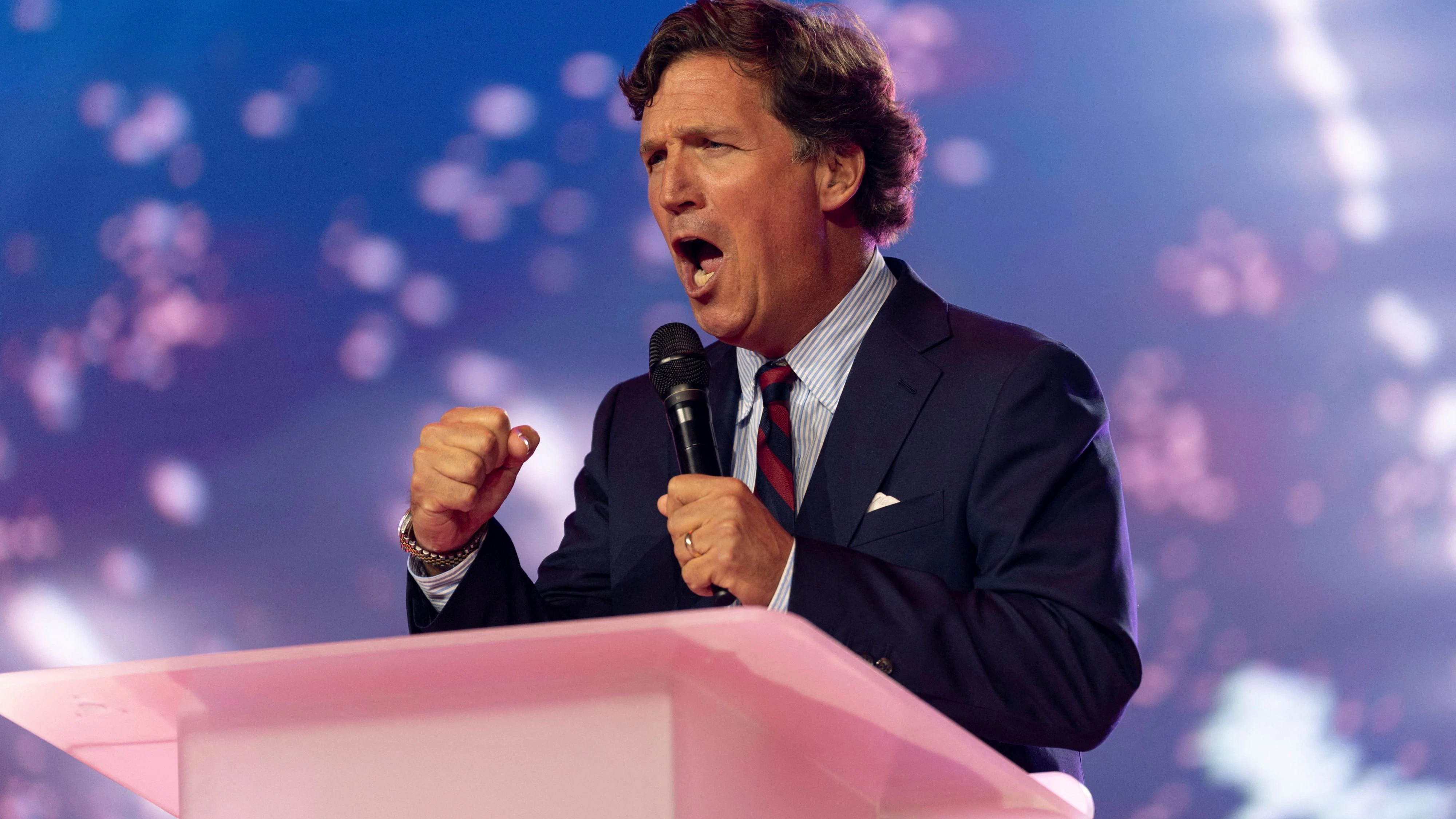 Tucker Carlson speaks during AmericaFest, the first Turning Point USA summit since the death of Charlie Kirk, in Phoenix, Arizona, U.S. December 18, 2025. REUTERS/Cheney Orr