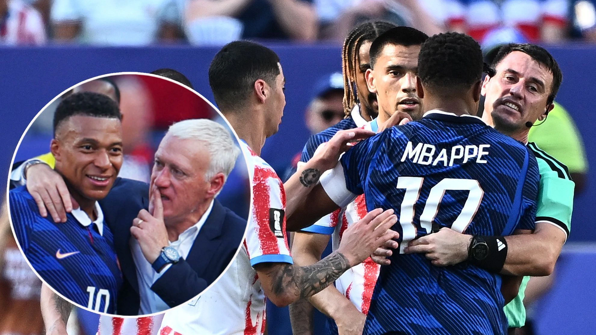 Kylian Mbappe muss von Teamchef Didier Deschamps und von Referee Ilgiz Tantashev zurückgehalten werden