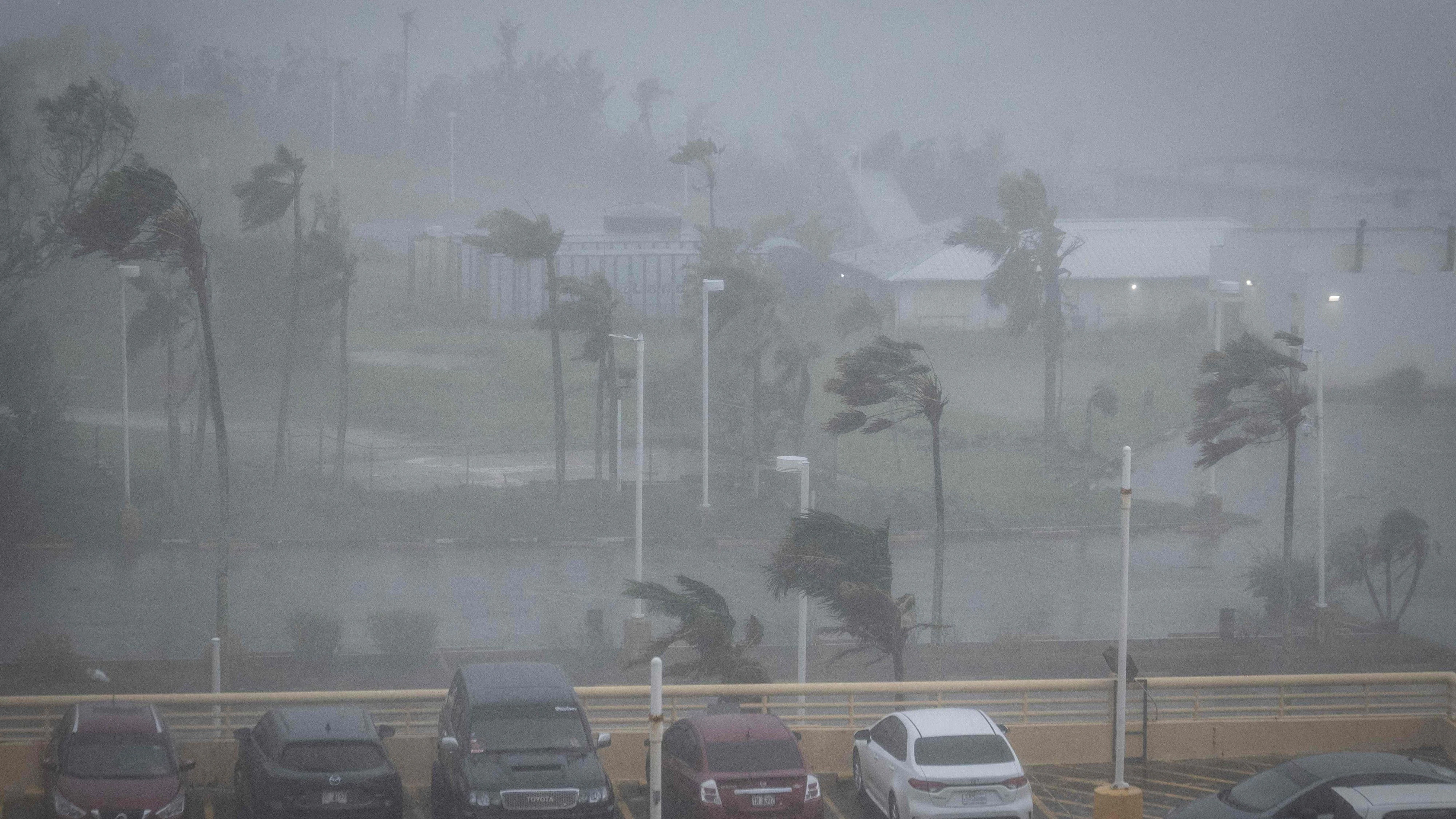 TOPSHOT - Strong wind brought by Super Typhoon Bavi hits Guam on July 6, 2026. (Photo by Yuichi YAMAZAKI / AFP)