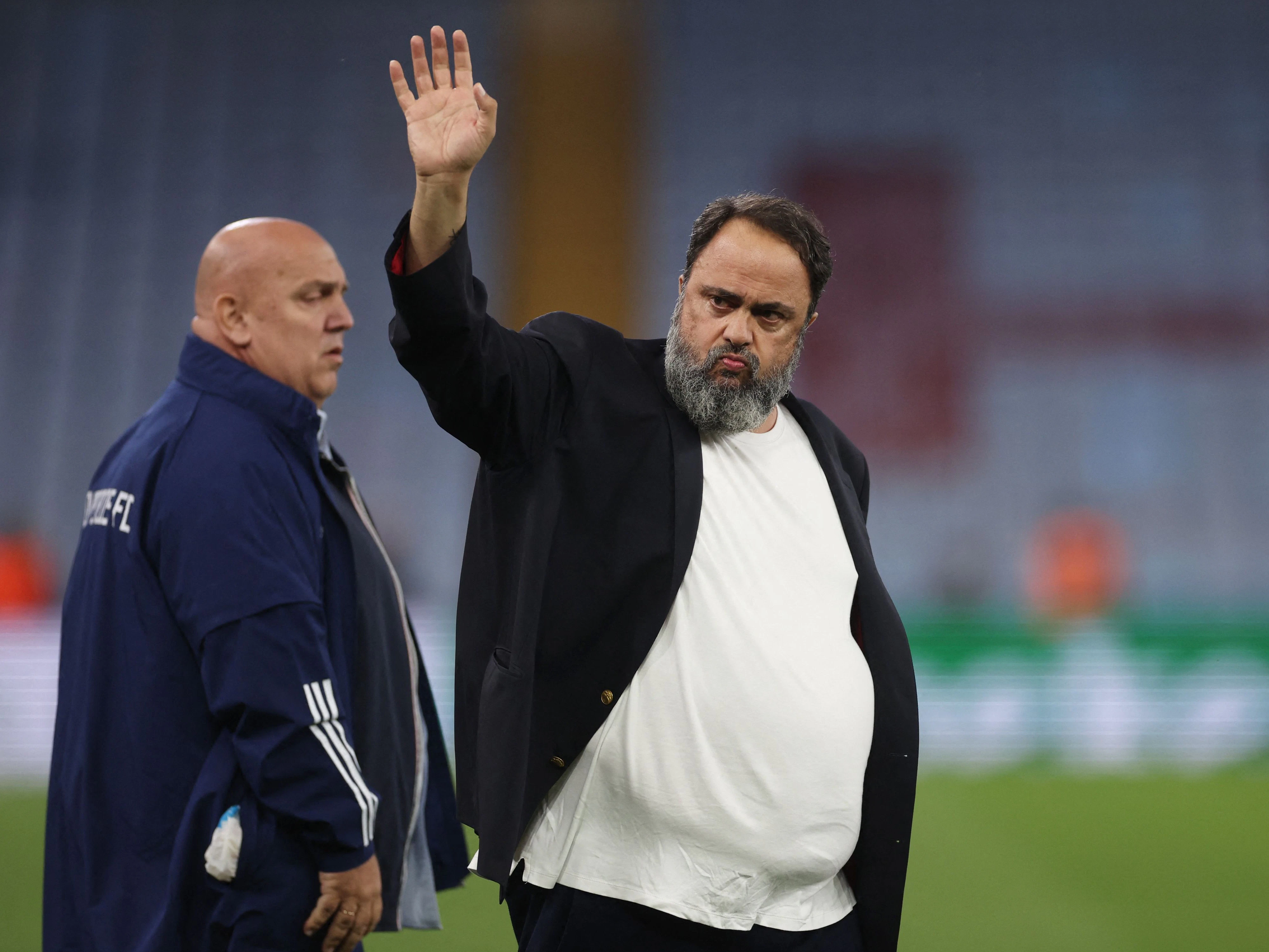 Evangelos Marinakis (r.)