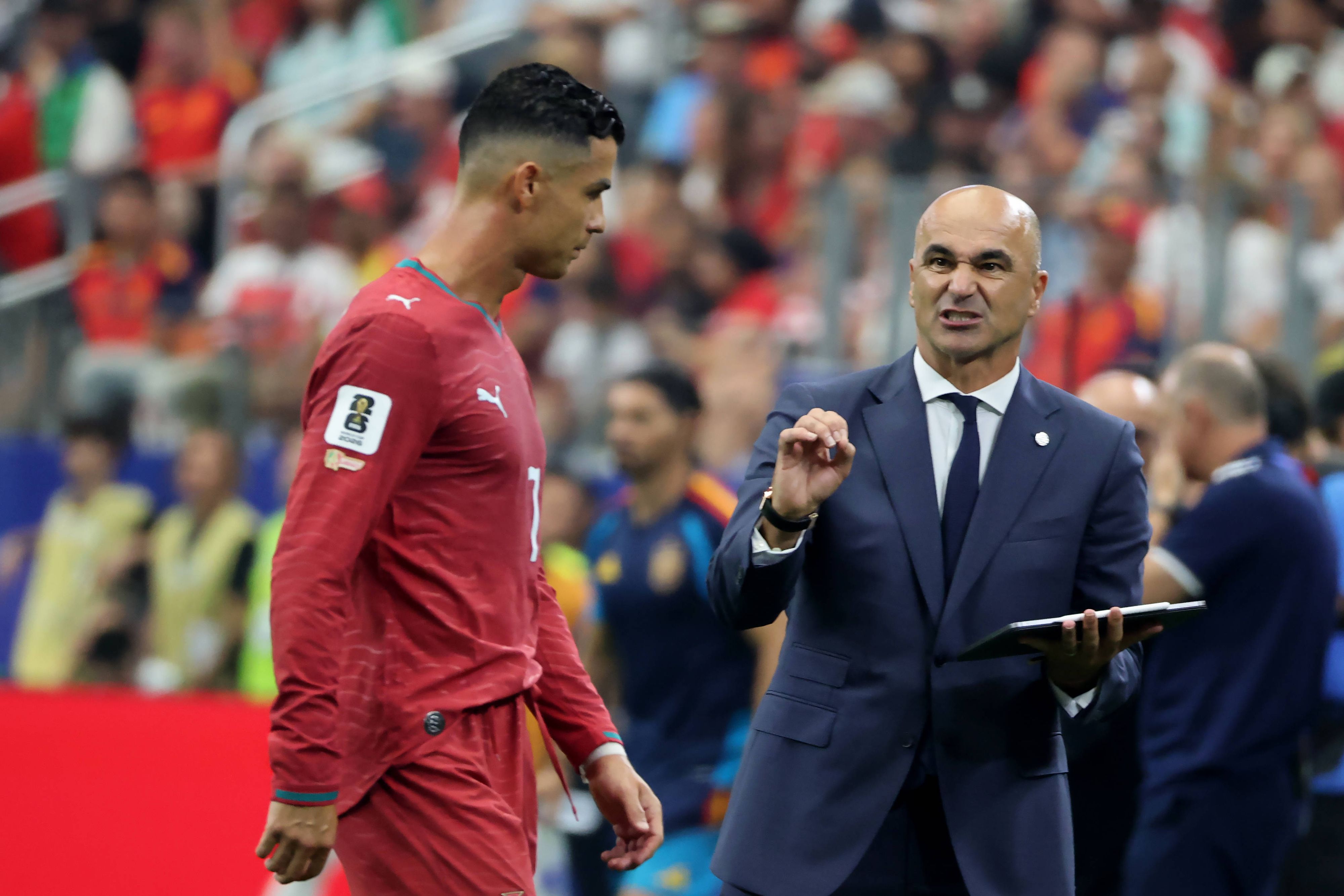 Cristiano Ronaldo und Roberto Martinez.