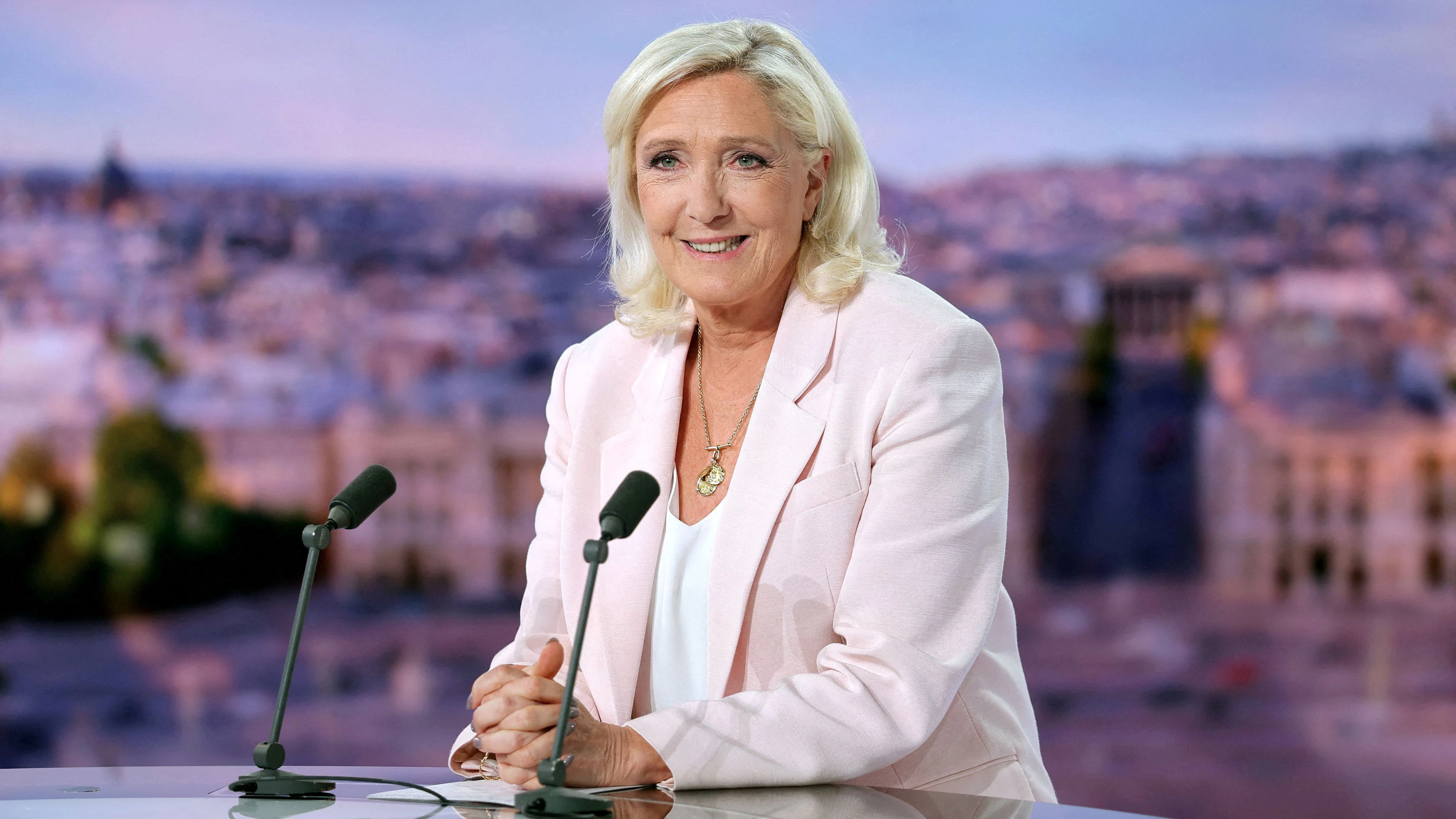 French far-right leader Marine Le Pen, member of parliament for the Rassemblement National (National Rally - RN) party, poses prior to an interview on the evening news broadcast of French TV channel TF1, following the verdict in her appeal trial over misuse of EU funds, in Boulogne-Billancourt, near Paris, France, July 7, 2026. REUTERS/Christian Hartmann/Pool      TPX IMAGES OF THE DAY     
