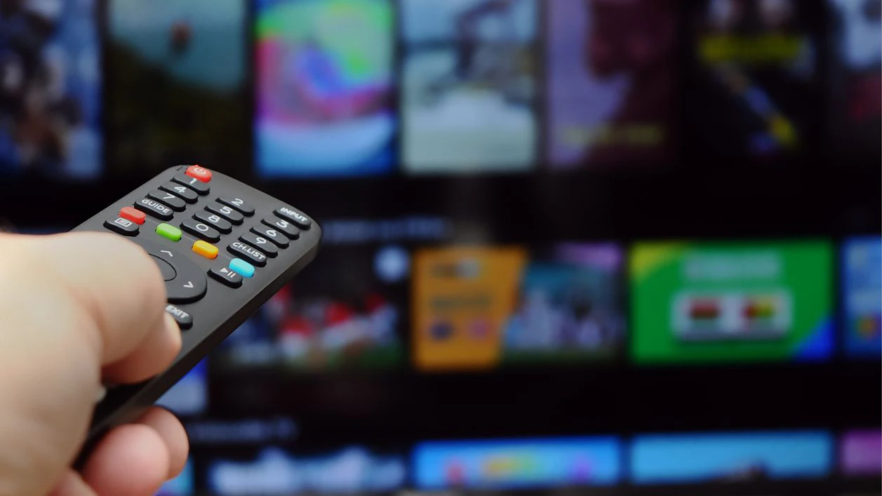 Changing the channel on the TV via the remote control at home, office, or powering on/off