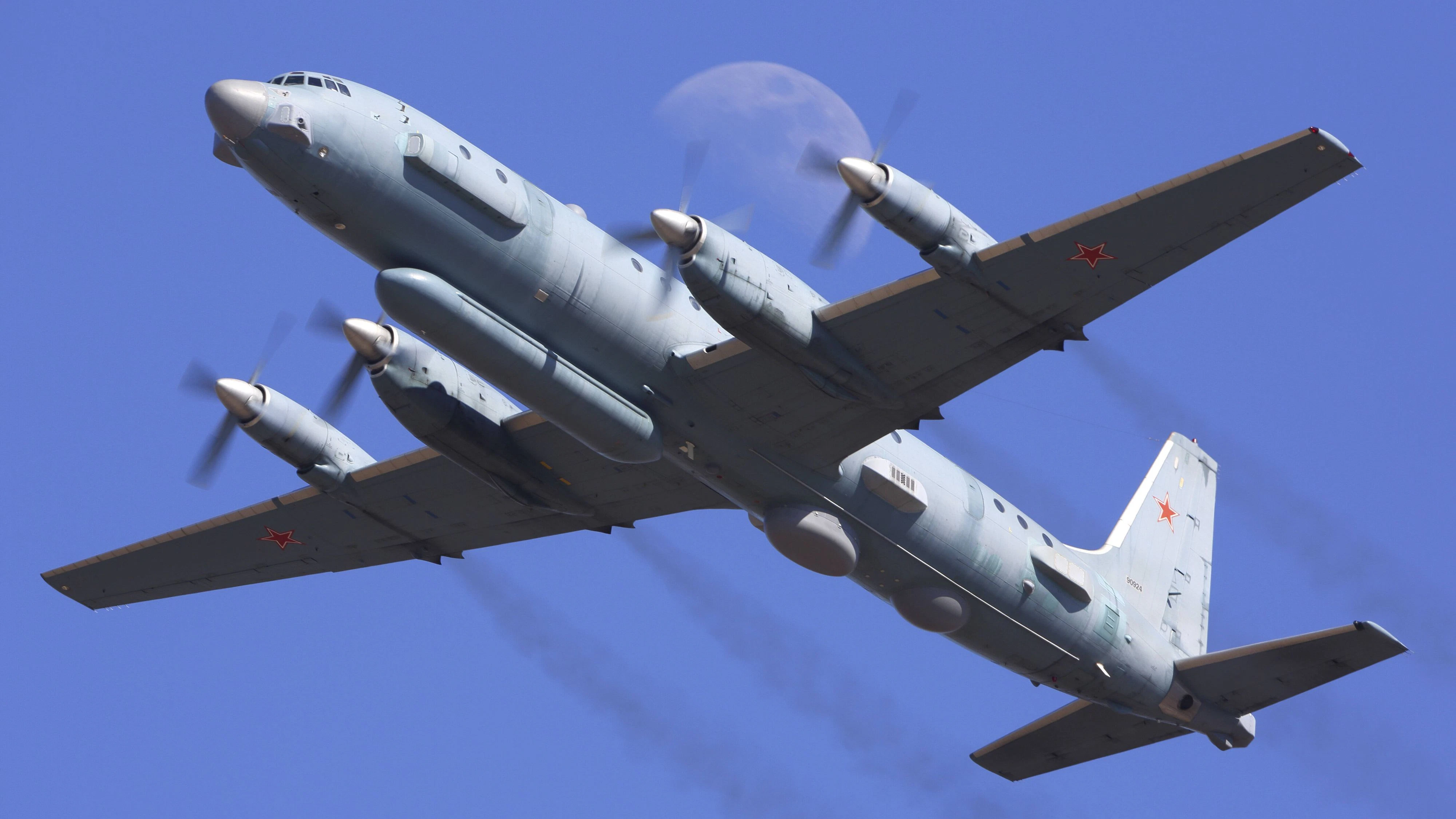 IL-20M reconnaissance aircraft of the Russian Air Force in flight in front of the moon, Zhukovsky, Russia. Copyright: ArtemxAlexandrovich/StocktrekxImages ANK100835M 