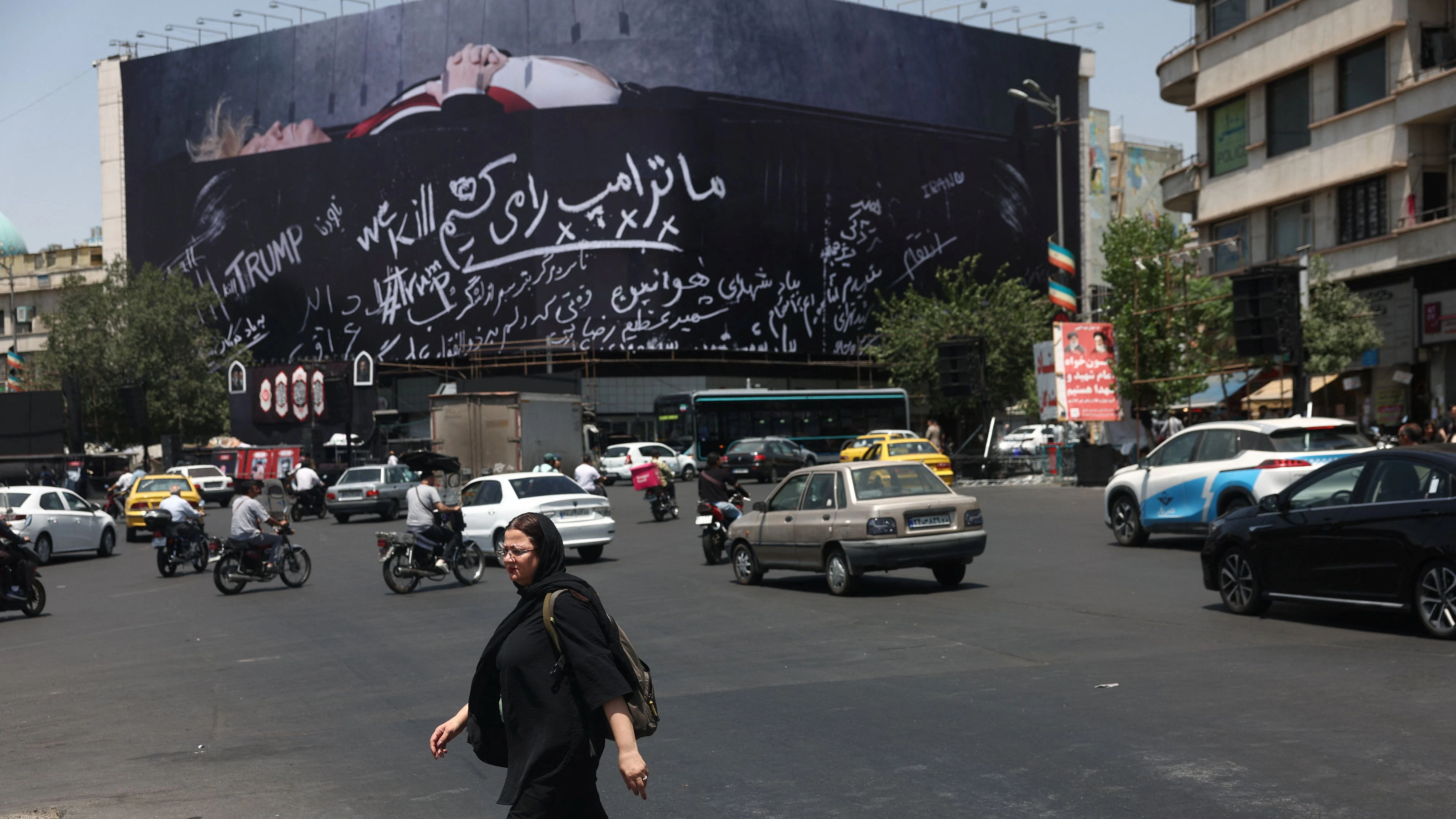 A billboard depicting U.S. President Donald Trump laid in a coffin is displayed on a building in Tehran, Iran, July 15, 2026. Majid Asgaripour/WANA (West Asia News Agency) via REUTERS ATTENTION EDITORS - THIS PICTURE WAS PROVIDED BY A THIRD PARTY. ISRAEL OUT. NO COMMERCIAL OR EDITORIAL SALES IN ISRAEL. NO ACCESS FOR ISRAELI MEDIA. NO USE BBC PERSIAN. NO USE VOA PERSIAN. NO USE MANOTO. NO USE IRAN INTERNATIONAL. NO USE RADIO FARDA. DIGITAL: NO USE BBC PERSIAN. NO USE VOA PERSIAN. NO USE MANOTO. NO USE IRAN INTERNATIONAL. NO USE RADIO FARDA.