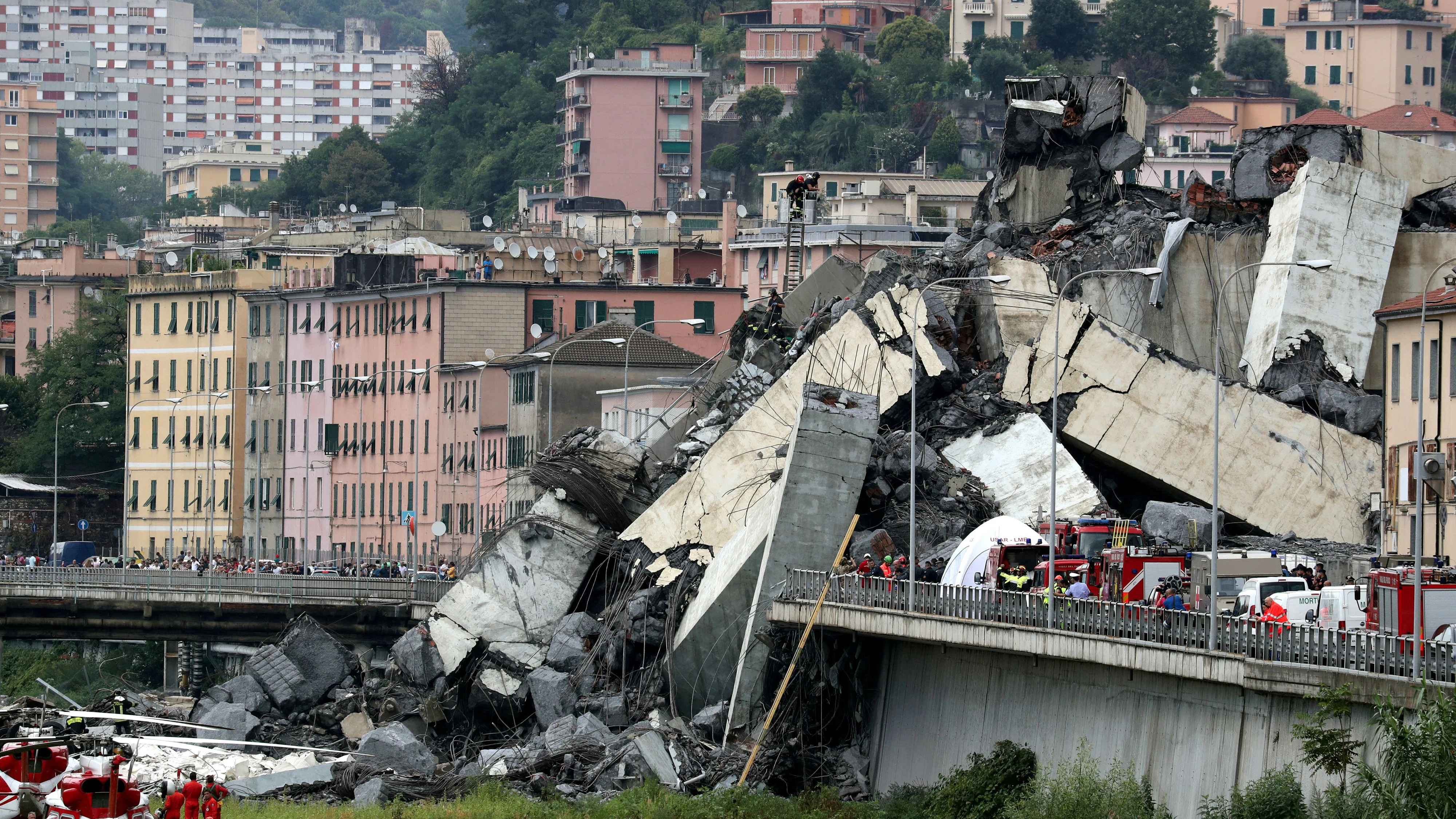 FILE PHOTO: The collapsed Morandi Bridge is seen in the Italian port city of Genoa, Italy, August 14, 2018. REUTERS/Stefano Rellandini/File Photo