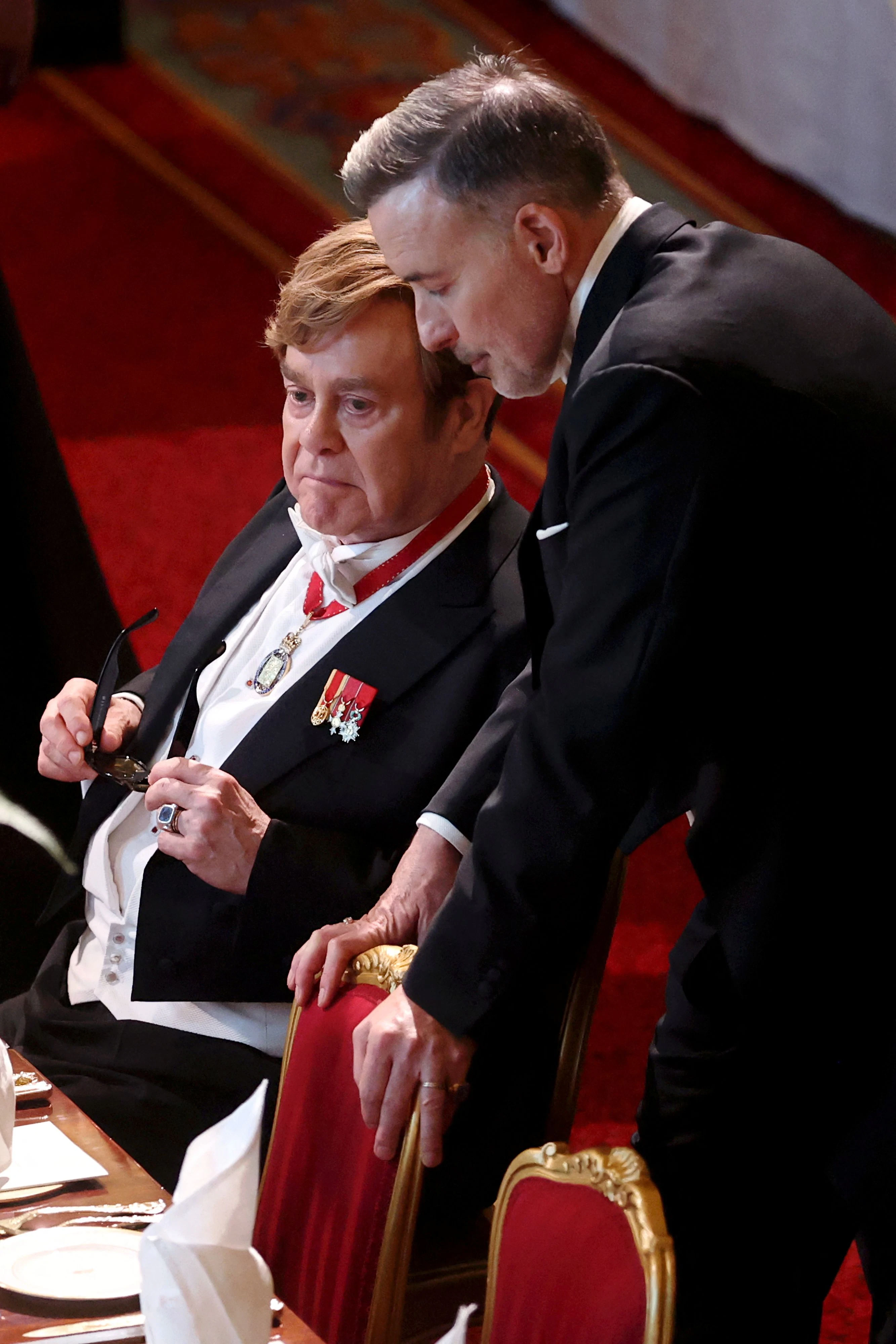 Können sich allfällige Millionenforderungen locker leisten: Sir Elton John und sein Ehemann David Furnish bei einem Staatsbankett in Windsor