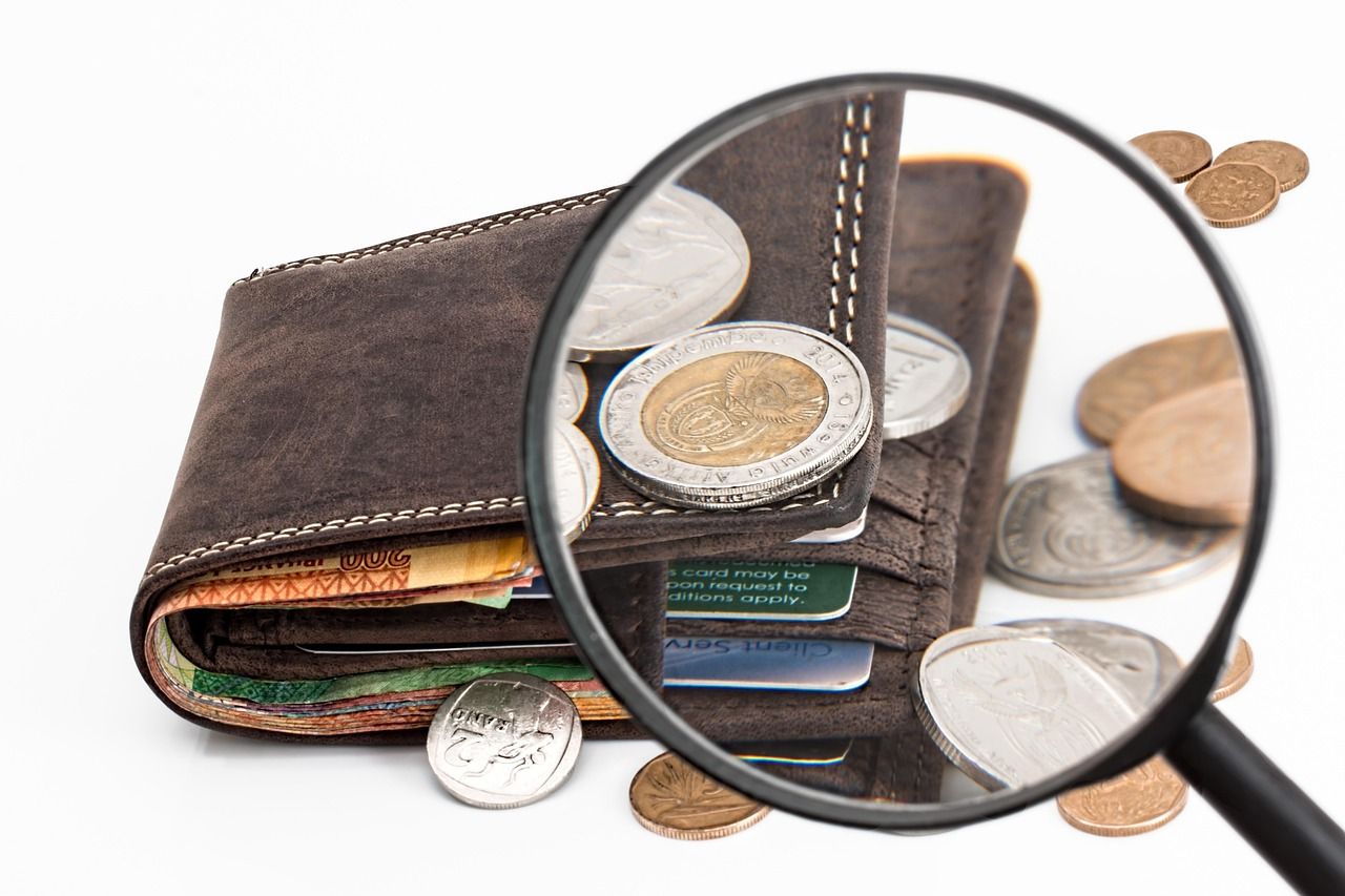 Geldbörse, Münzen und Finanzanalyse