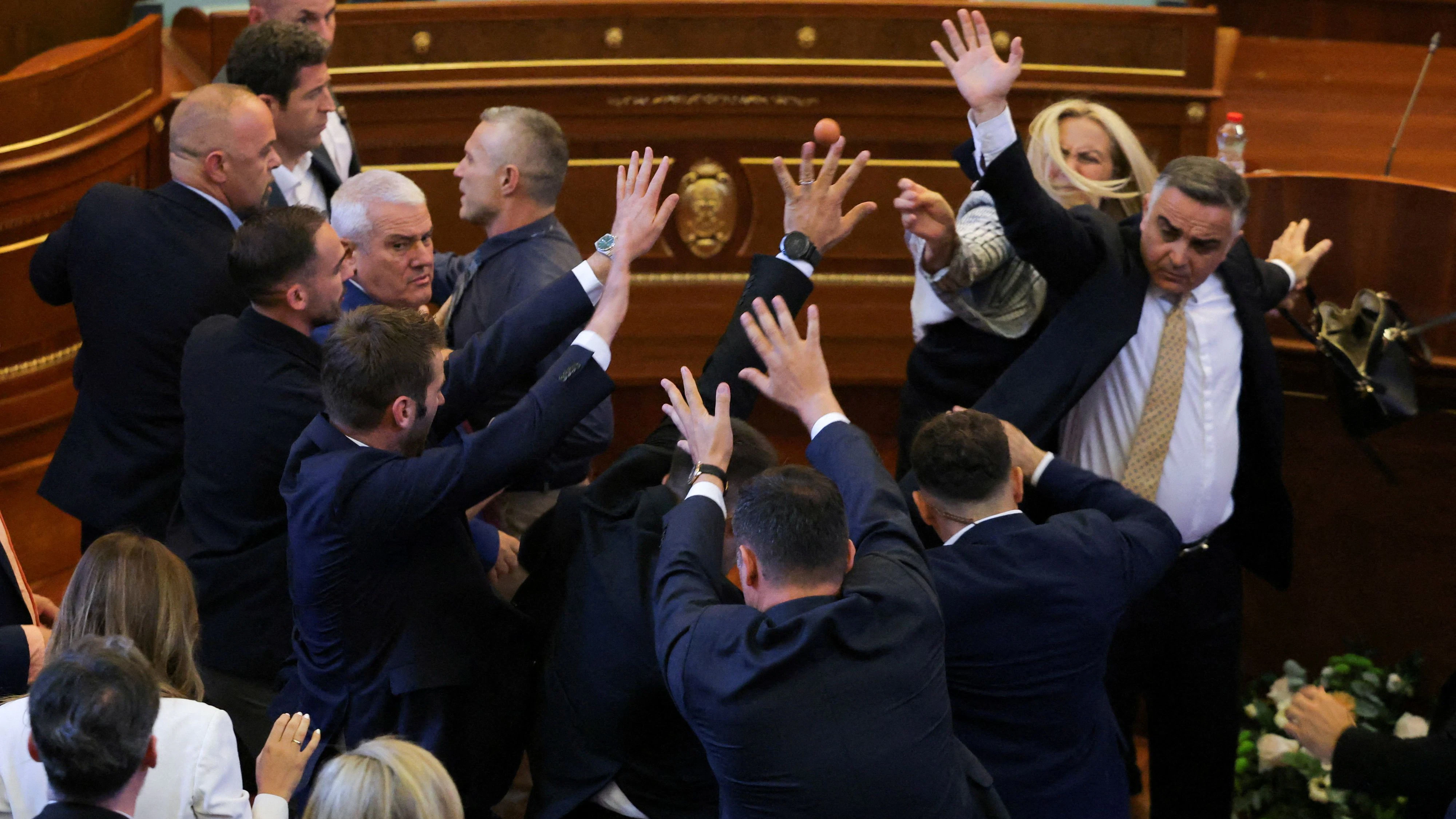 Kosovar lawmaker Time Kadriaj throws an egg at Prime Minister Albin Kurti (not pictured) during a plenary session to elect the new speaker of the parliament, in Pristina, Kosovo, August 8, 2026. Kosovo's parliament remains unconstituted. REUTERS/Valdrin Xhemaj     TPX IMAGES OF THE DAY     