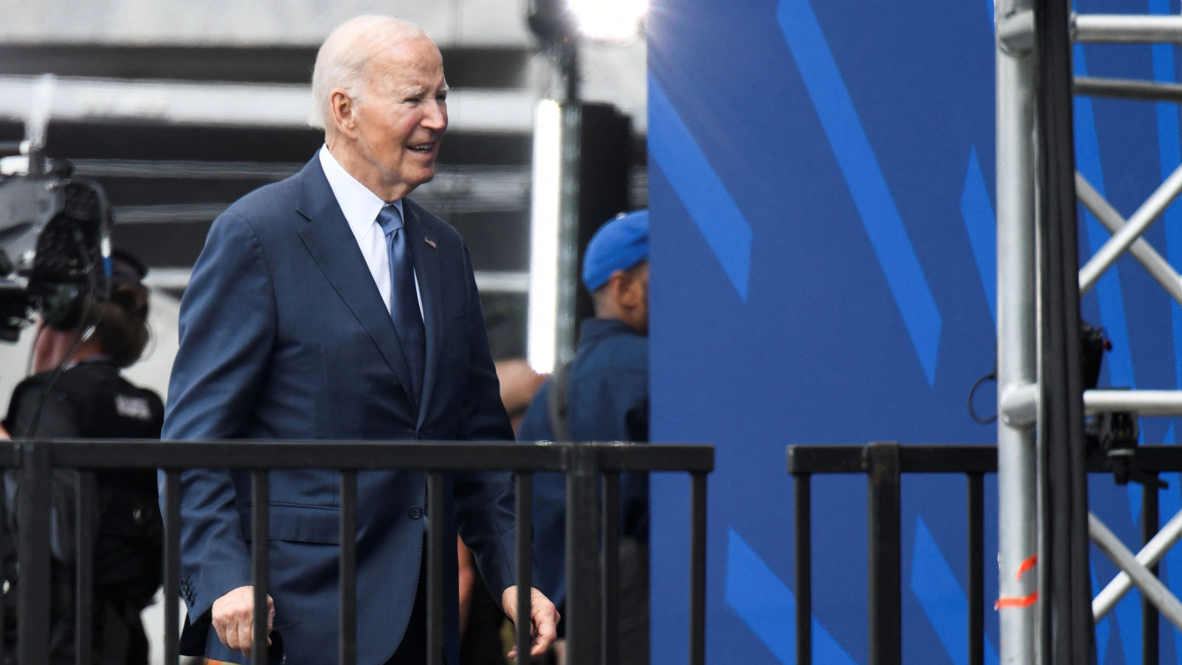 Former U.S. President Joe Biden leaves the stage following the dedication ceremony for the opening of the Obama Presidential Center in Chicago, Illinois, U.S., June 18, 2026. REUTERS/Octavio Jones