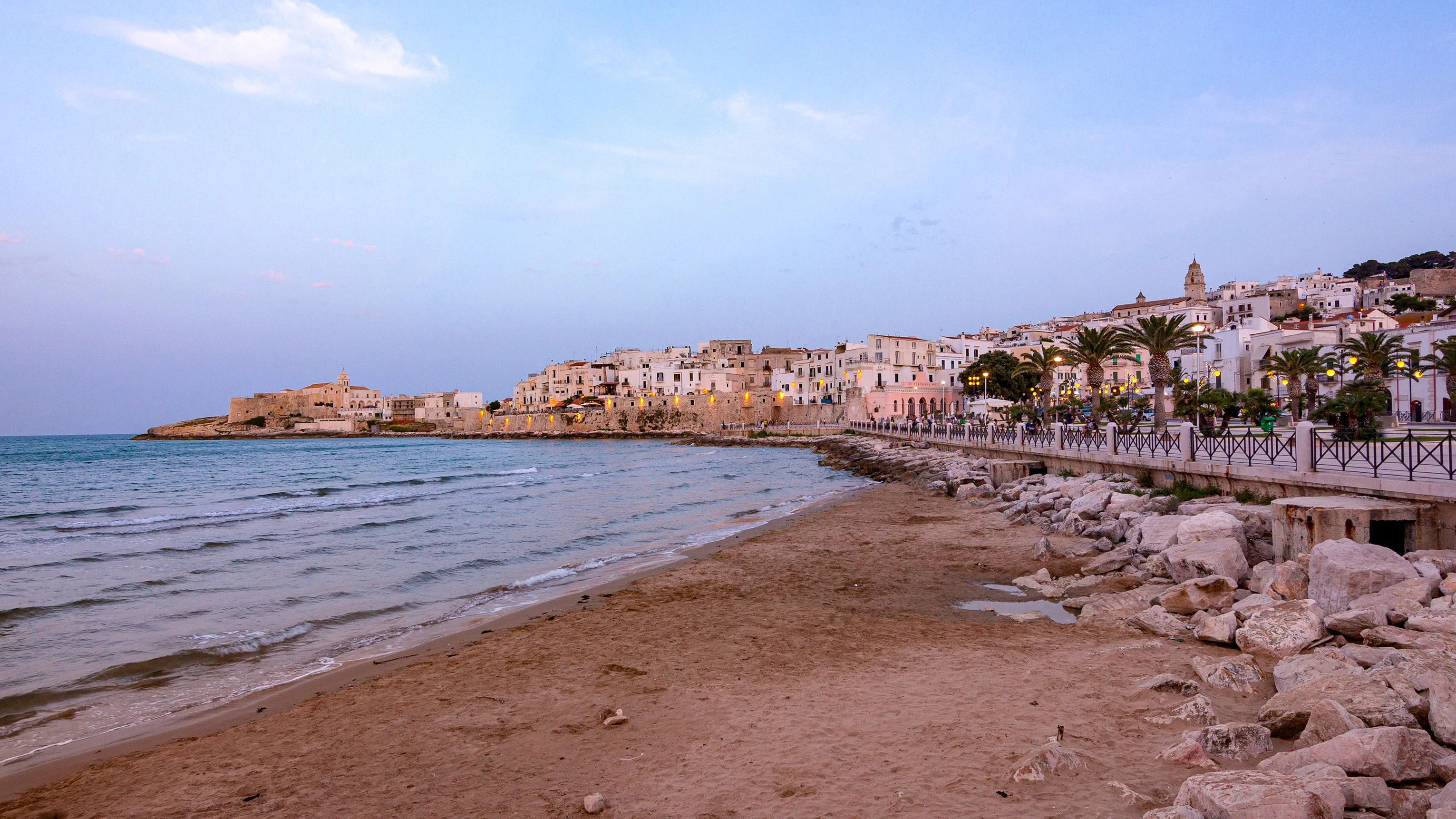 Vieste, Foggia, Italy 29 June 2021 View over historic old town on blue hour at Vieste, Gargano, Apulia, Italy