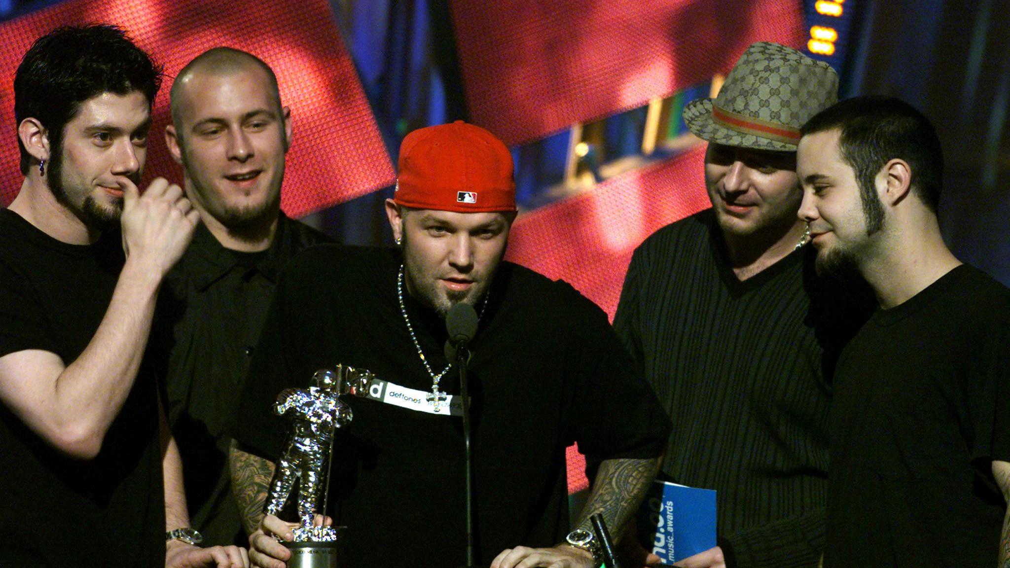 Fred Durst of the band Limp Bizkit accepts the Best Rock Video award for Significant Other" at the MTV Video Music Awards in New York on September 7, 2000. Band members from left, are:  Wes Borland, Sam Rivers, Durst, DJ Lethal and Jon Otto.