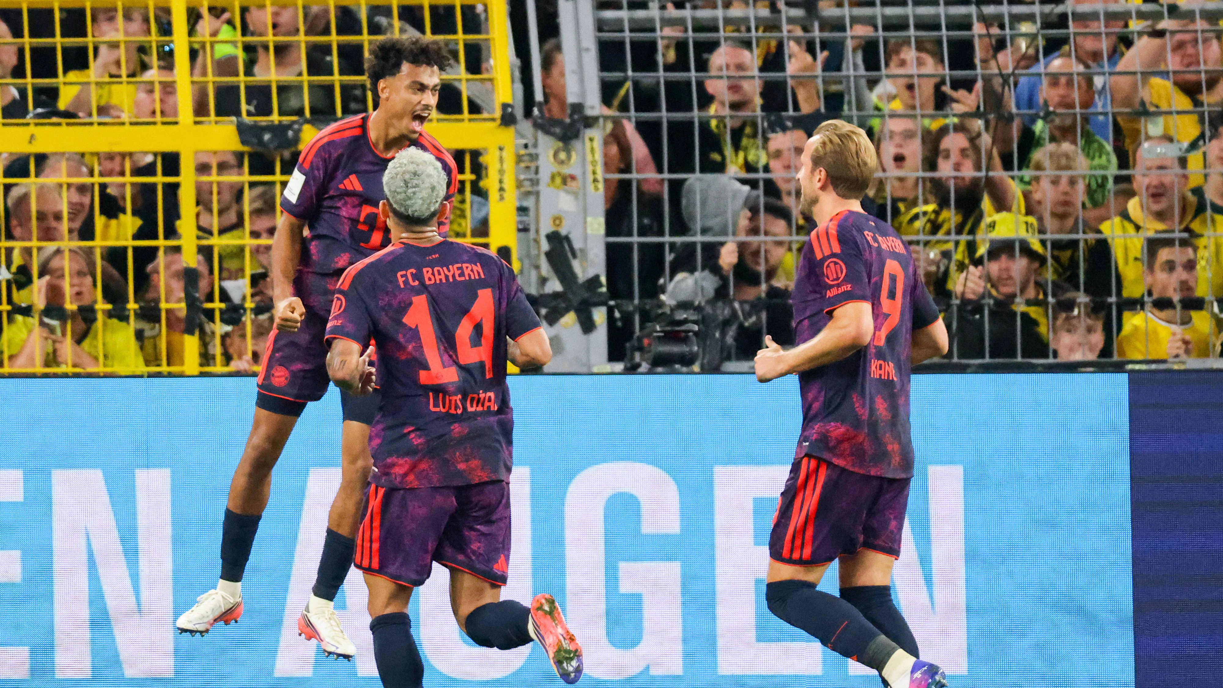 Dortmund, Deutschland: 22.08.2026 - Franz Beckenbauer Supercup 2026 - Borussia Dortmund vs. FC Bayern München Im Bild: v.li. Torschütze Nathaniel Brown FCB macht das Tor zum 1:0 für München und jubelt mit Luis Diaz FCB DFL DFB REGULATIONS PROHIBIT ANY USE OF PHOTOGRAPHS as IMAGE SEQUENCES and or QUASI-VIDEO *** *** Dortmund, Germany, August 22, 2026 Franz Beckenbauer Super Cup 2026 Borussia Dortmund vs. FC Bayern Munich Pictured from left: Goal scorer Nathaniel Brown FCB scores the 10 goal for Munich and celebrates with Luis Diaz FCB. DFL and DFB regulations prohibit any use of PHas IMAGE SEQUENCES and/or QUASI-VIDEO *** Copyright: HMBxMedia/MadeleinexFantini