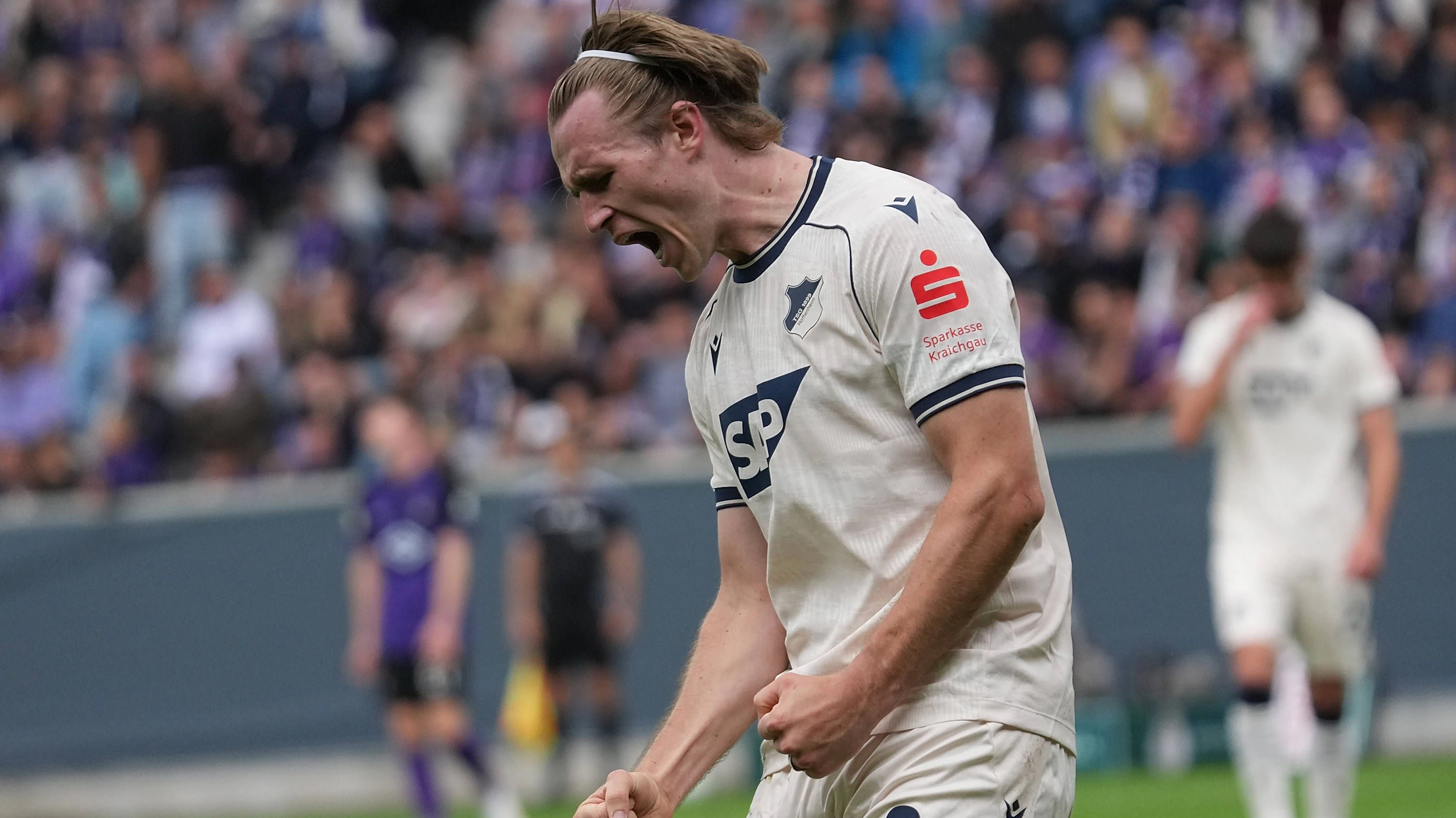 22.08.2026, eins Erzgebirgsstadion, Aue, GER, DFB Pokal, Erzgebirge Aue vs TSG Hoffenheim , Patrick Wimmer Hoffenheim freut sich ueber das Tor zum 0:2. Photo by Hasan Bratic /DeFodi Images - *** August 22, 2026, Erzgebirgsstadion, Aue, GER, DFB Cup, Erzgebirge Aue vs. TSG Hoffenheim Patrick Wimmer of Hoffenheim celebrates scoring the goal to make it 02. Photo by Hasan Bratic, DeFodi Images