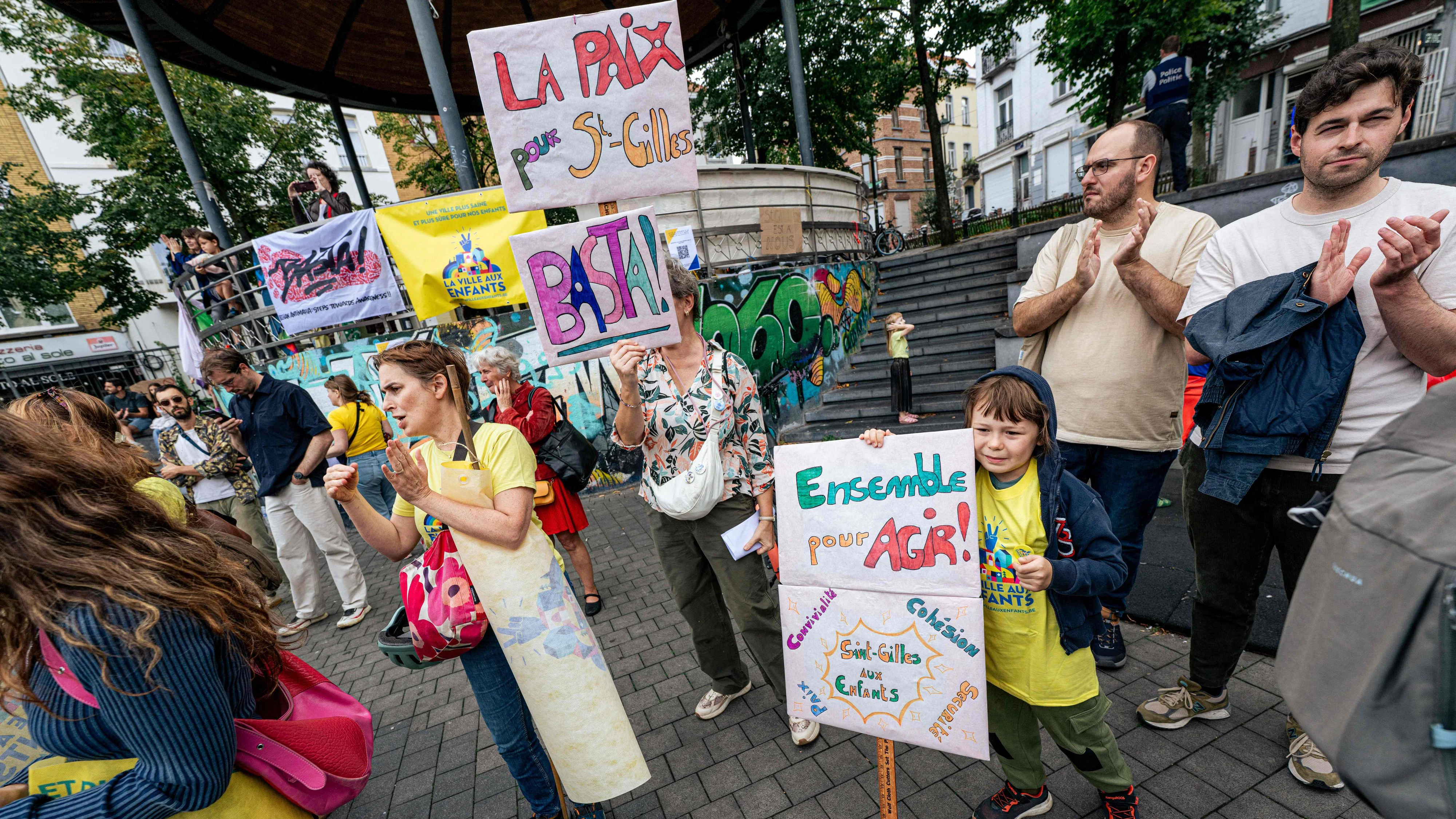 Protesters gather in Saint-Gilles to call for a response to drug trafficking and the increase in shootings in the Belgian capital, in Brussels, on August 30, 2026. Hundreds of people, including many parents of students, demonstrated in Saint-Gilles, a working-class commune in the south of Brussels, where shootings have multiplied in recent weeks, including a children's choir and musical entertainment. (Photo by EMILE WINDAL / Belga / AFP) / Belgium OUT