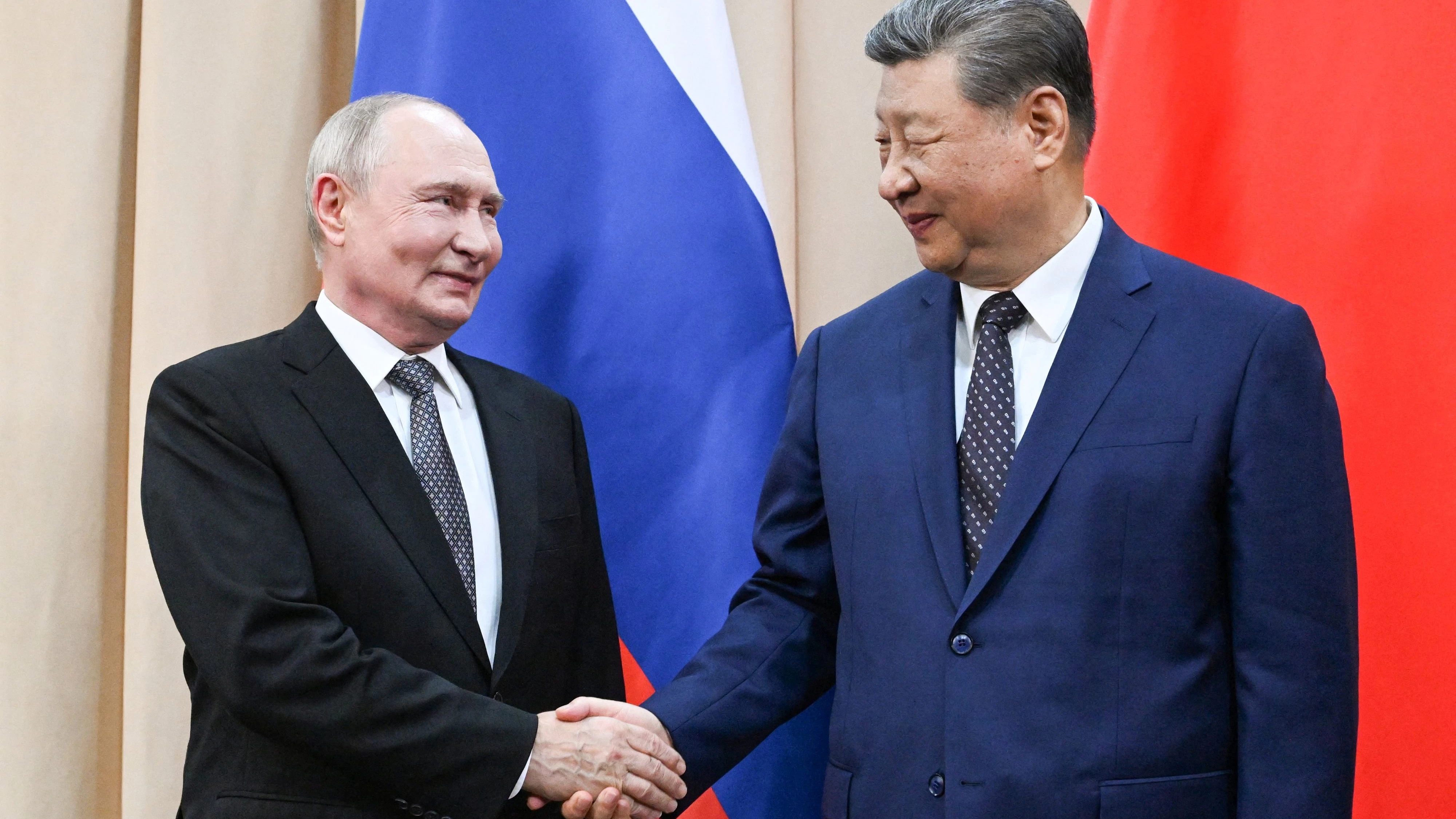 Russian President Vladimir Putin and Chinese President Xi Jinping shake hands during a meeting on the sidelines of the Shanghai Cooperation Organisation summit in Bishkek, Kyrgyzstan, August 31, 2026. Sputnik/Kristina Solovyova/Pool via REUTERS ATTENTION EDITORS - THIS IMAGE WAS PROVIDED BY A THIRD PARTY.
