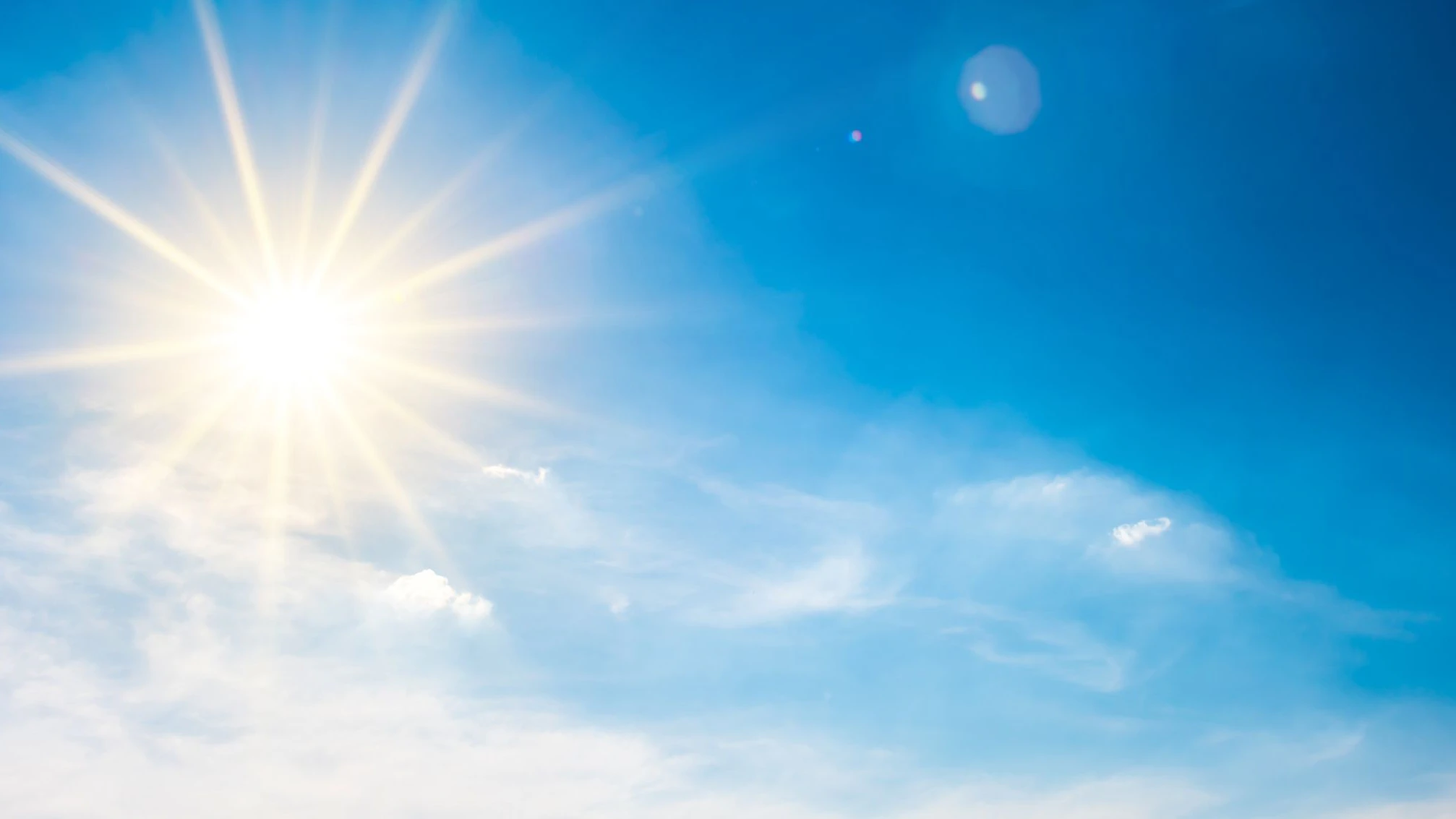 Summer background, wonderful blue sky with bright sun