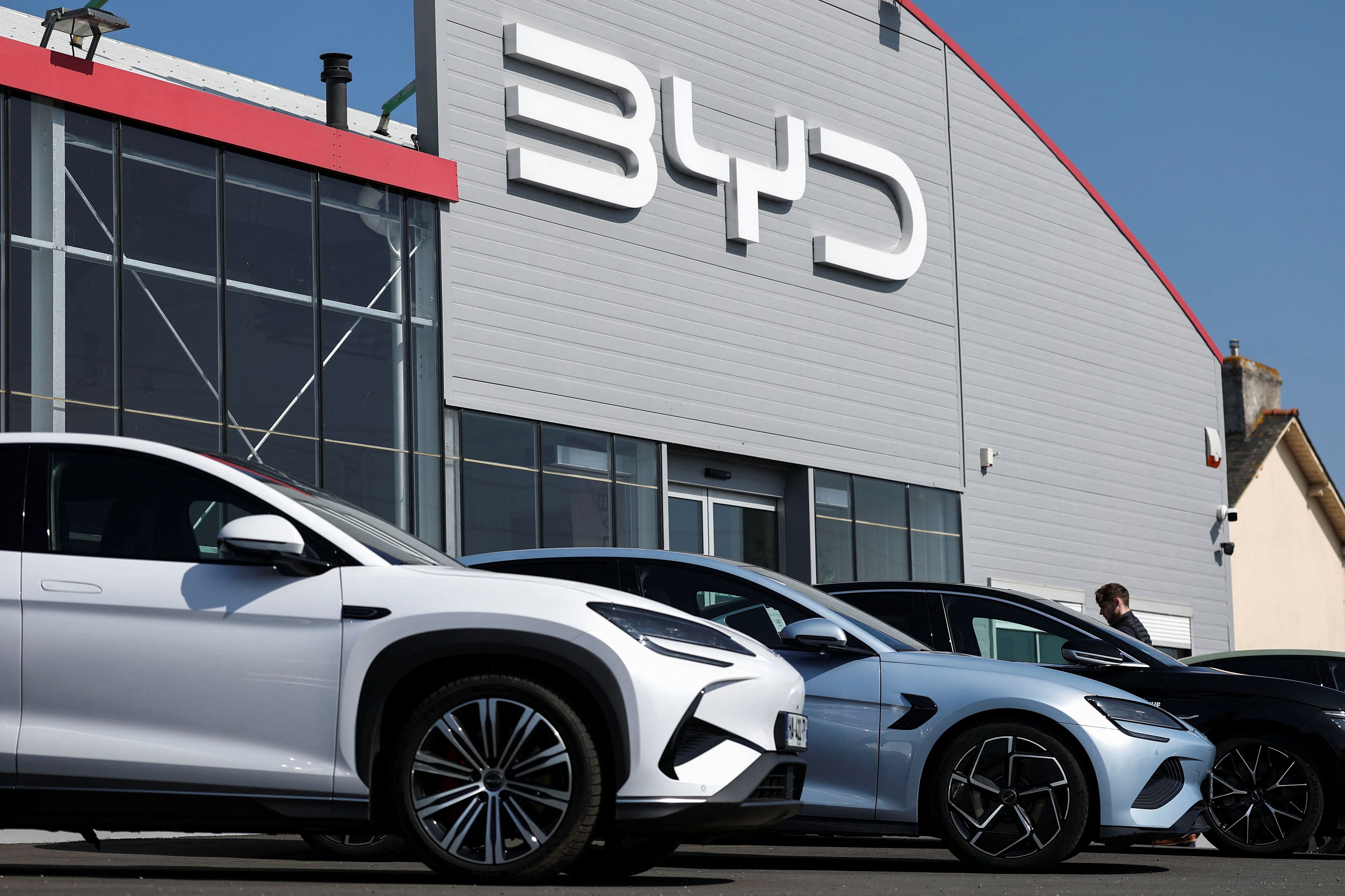 The logo of BYD is pictured at a dealership in Reze near Nantes, France, March 27, 2025. REUTERS/Stephane Mahe